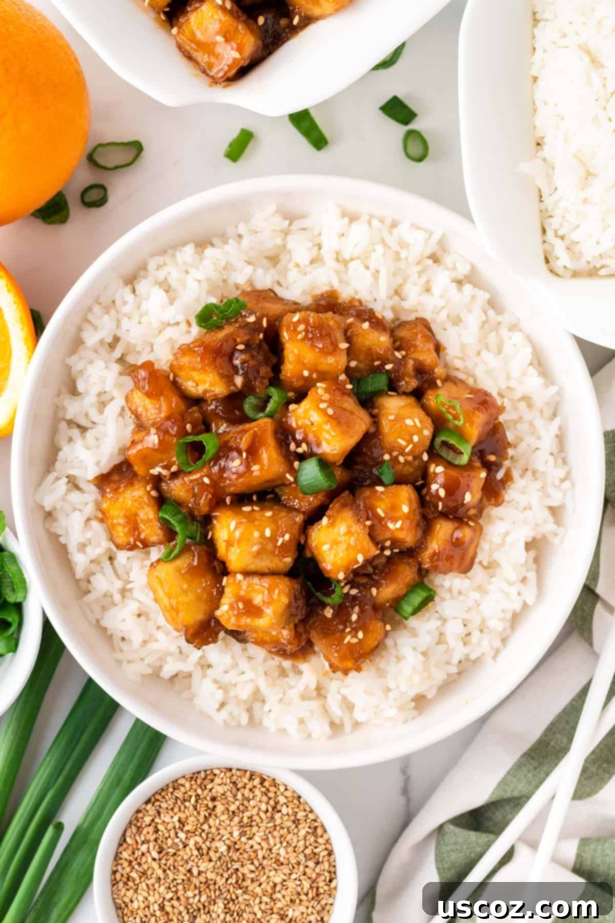 Zesty Orange Tofu 17 orange tofu over rice in a bowl