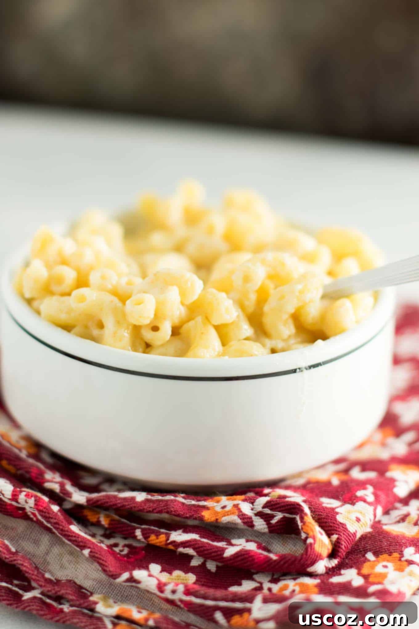 Robust Sharp Cheddar Mac and Cheese 7 creamy sharp cheddar mac and cheese in a pot, ready to be served