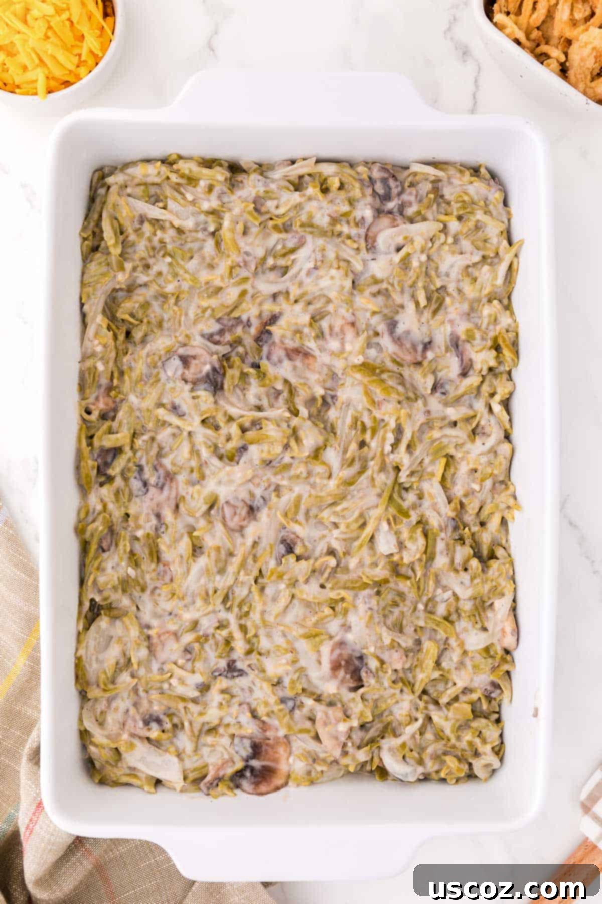 green bean mushroom mixture in the casserole dish