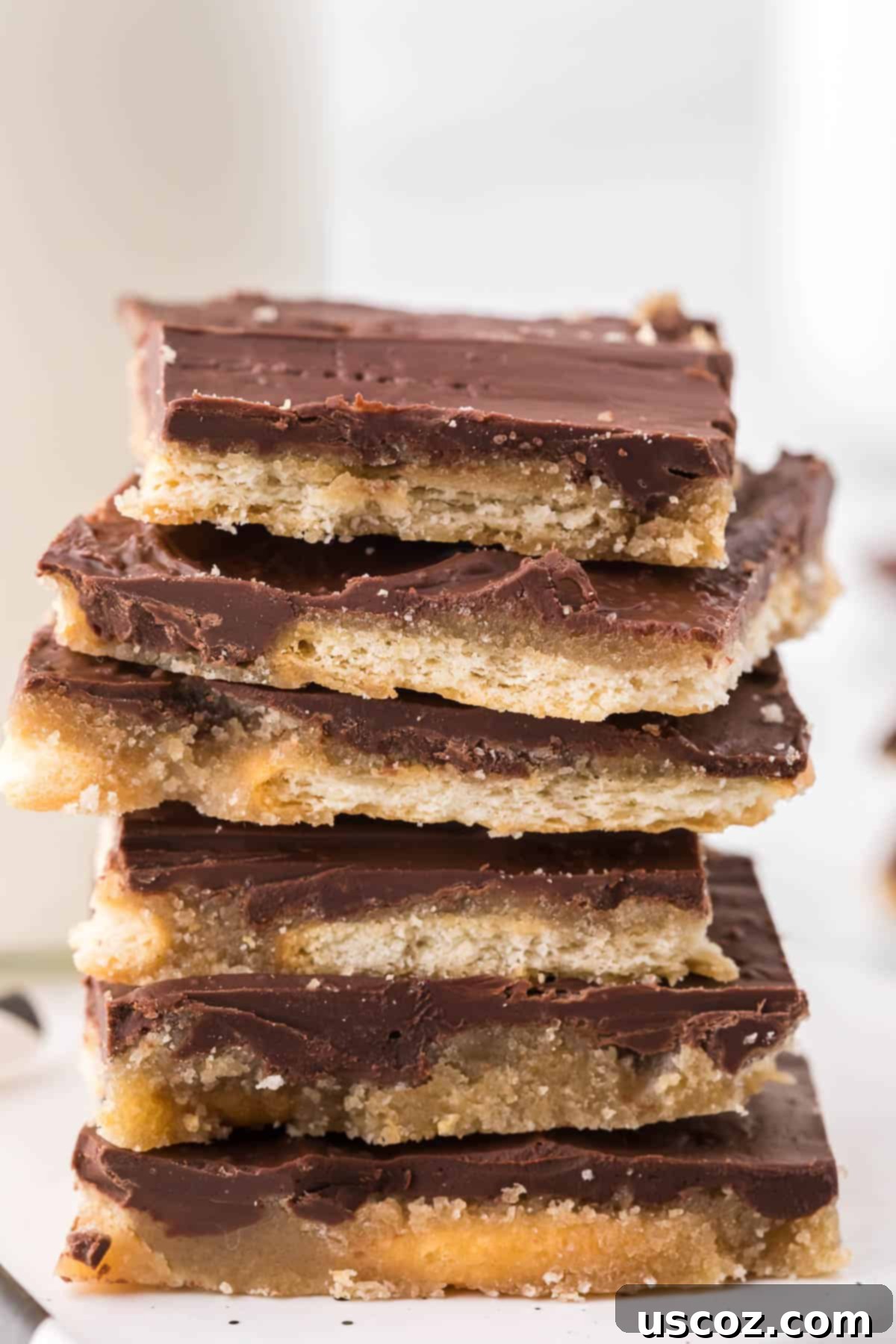 Sweet and Salty Ritz Cracker Toffee 9 Artfully arranged Ritz Cracker Toffee pieces, showcasing the texture and appeal of this easy holiday candy.