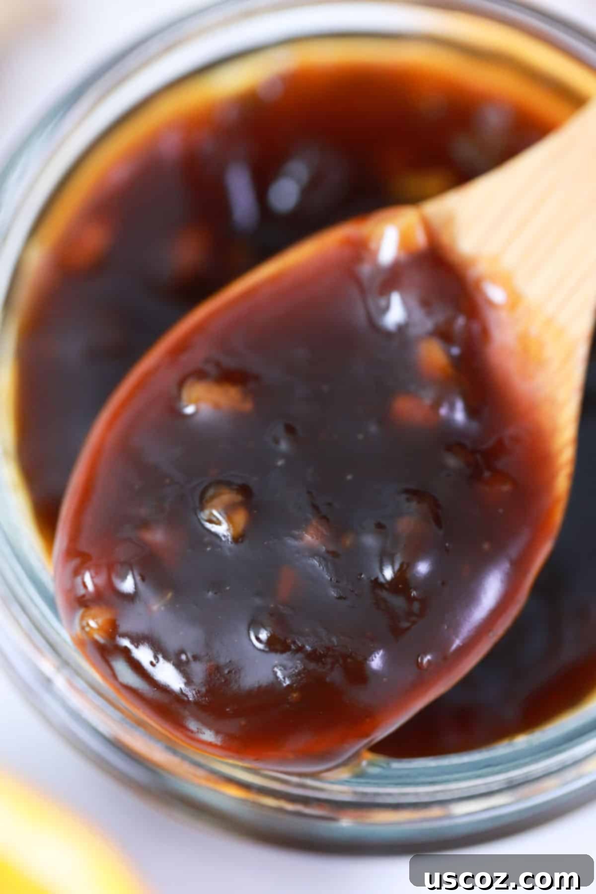 Homemade Teriyaki Sauce 8 A close-up view of the smooth, glossy texture of homemade teriyaki sauce, reflecting light and looking ready to enhance any dish.
