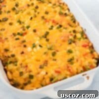 Golden Hash Brown Egg Bake 13 finished baked hash brown egg casserole in a white dish