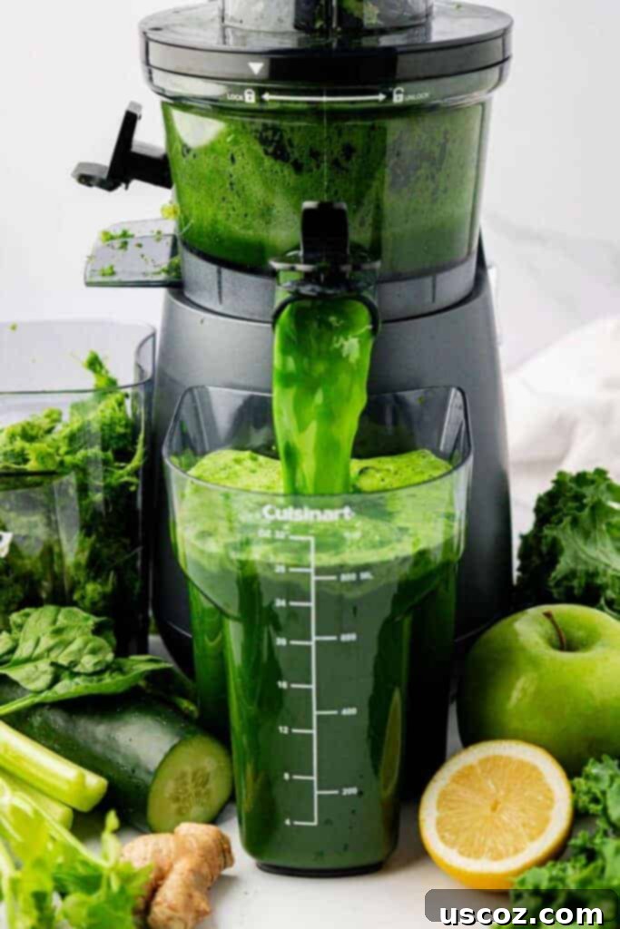 Your Daily Green Boost 5 green juice pouring out of a juicer