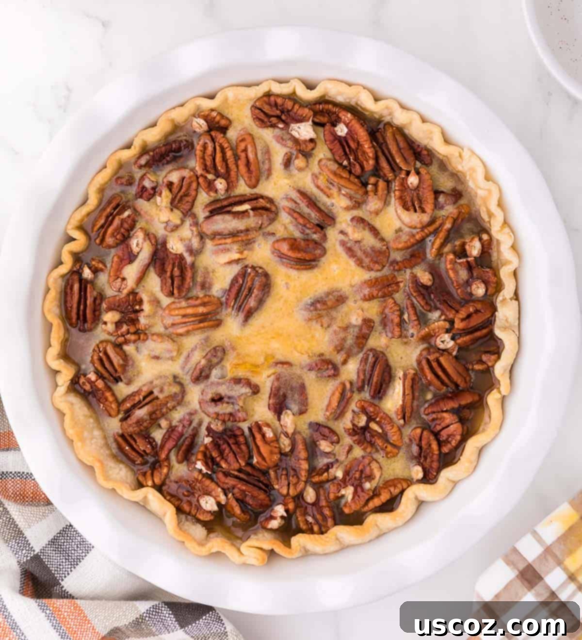 Sweet Maple Pecan Perfection 7 pouring the liquid filling over the pecans