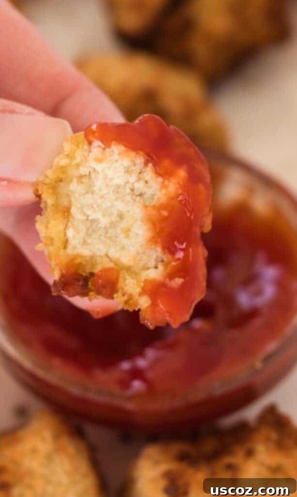 Crispy Air Fryer Tofu Nuggets 10 tofu nugget dipped in ketchup
