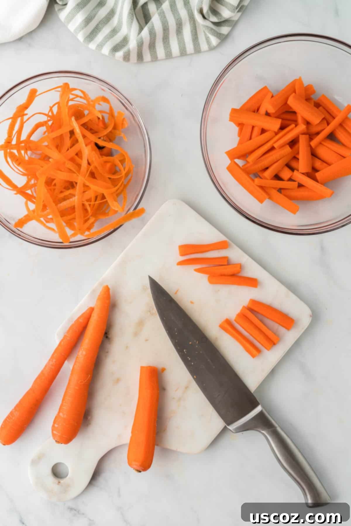 The Ultimate Roasted Carrots 4 carrots being cut up on a cutting board