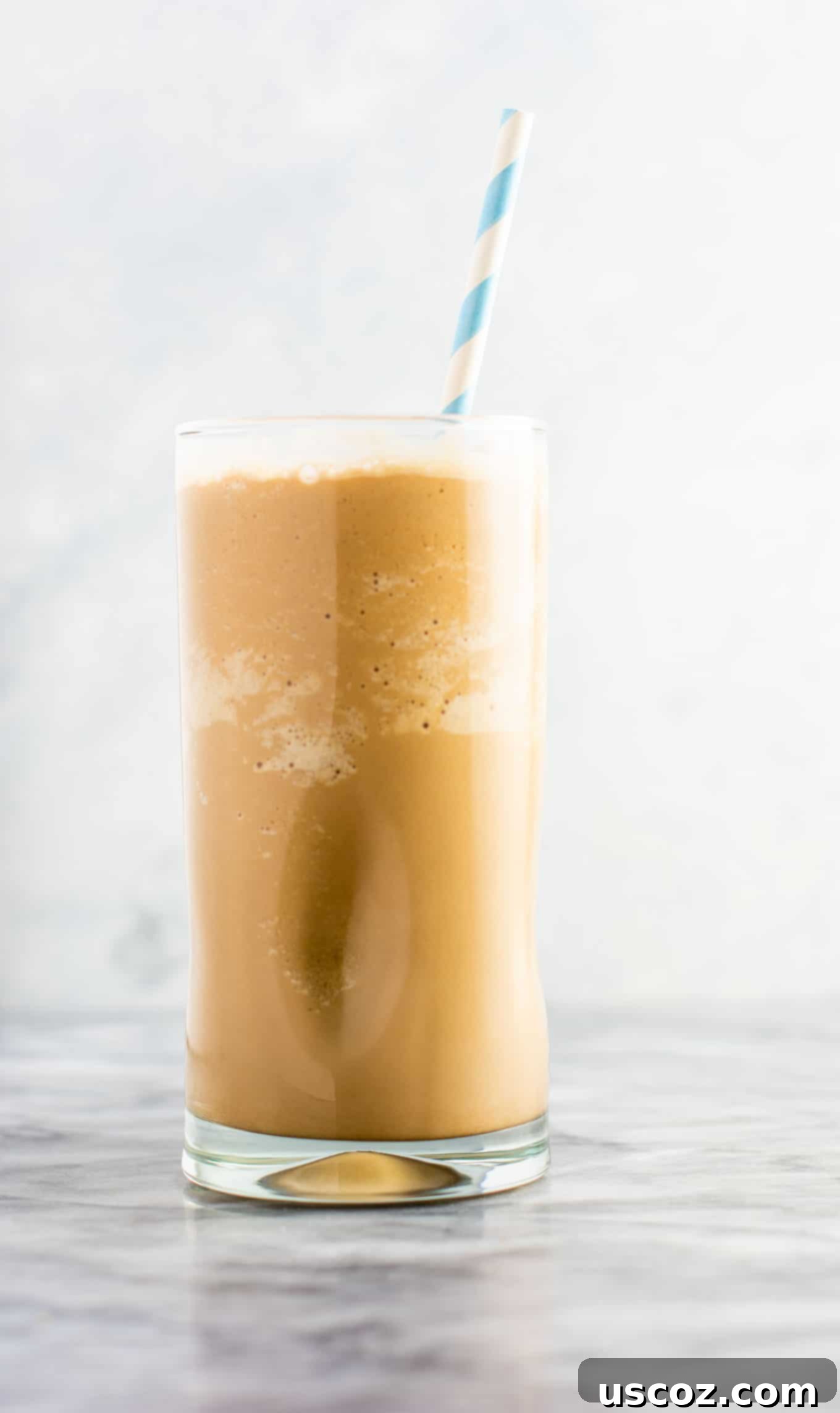 Homemade Frozen Coffee 4 Homemade frozen coffee with whipped cream and chocolate drizzle