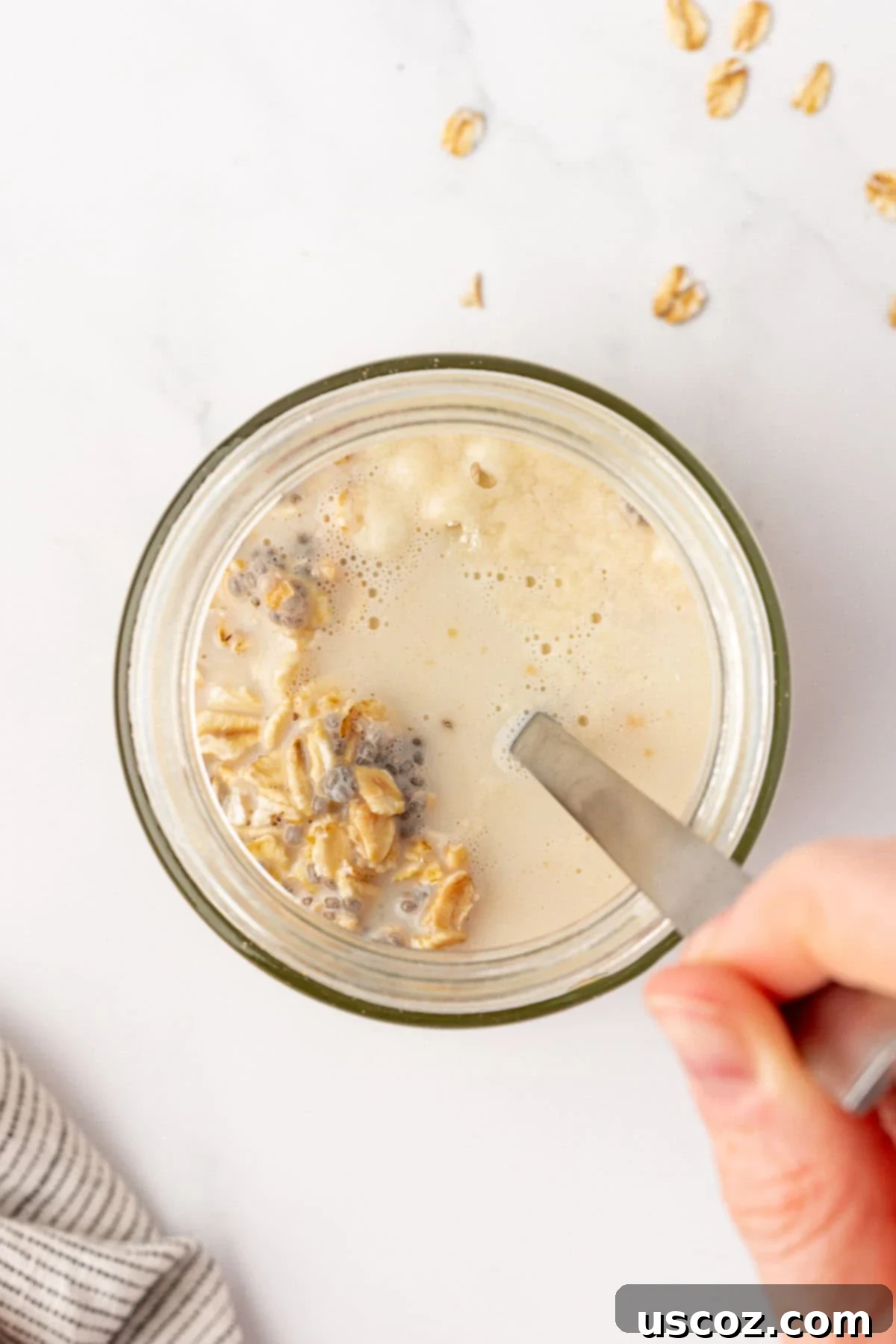 Power-Packed Overnight Oats 11 stirring the overnight oats ingredients together