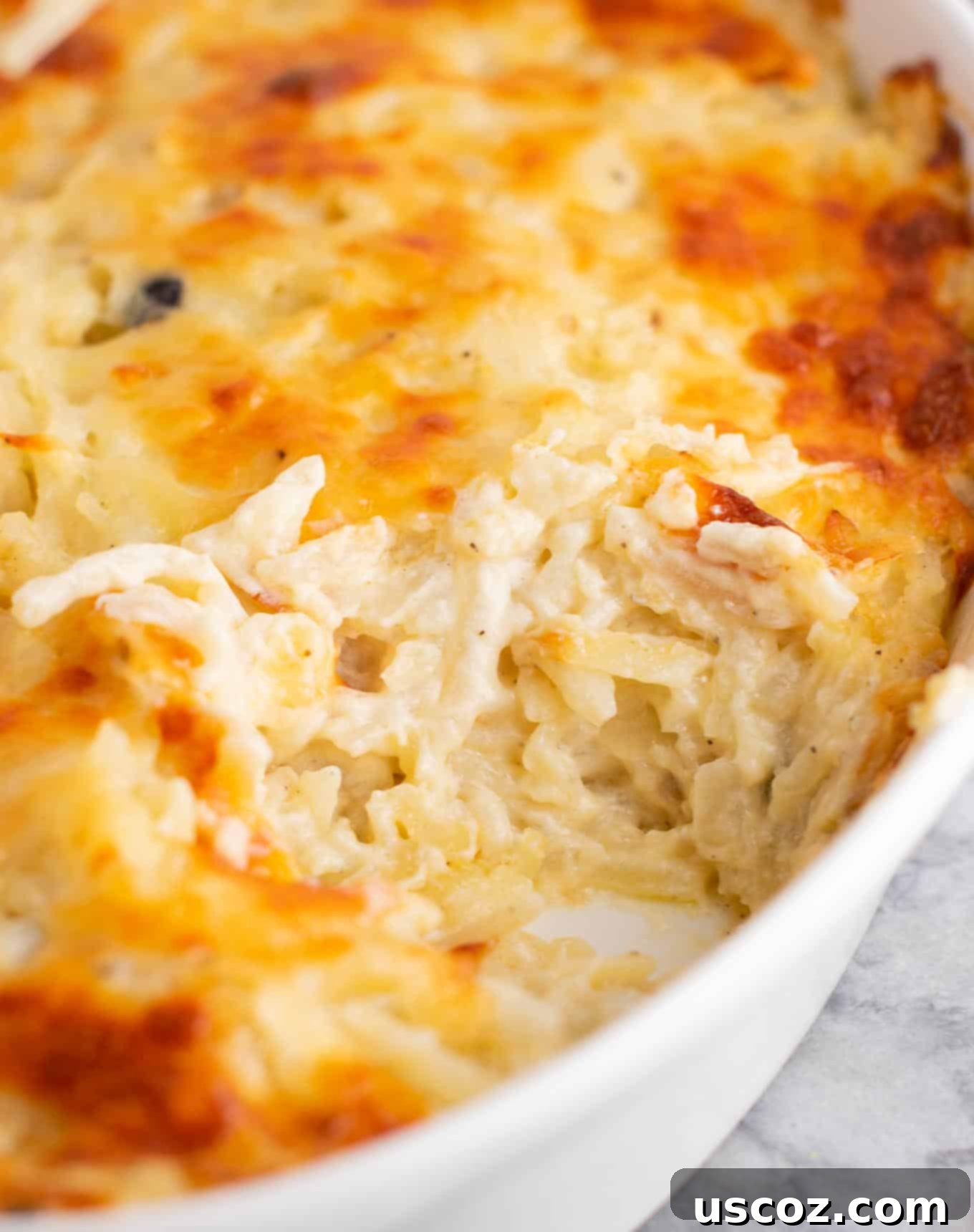 Hearty Hash Brown Bake 5 Bubbly and browned Vegetarian Hash Brown Casserole fresh from the oven