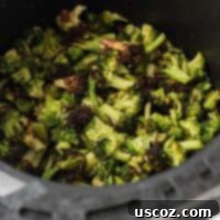 Crispy Air Fryer Frozen Broccoli 7 air fried frozen broccoli in the air fryer basket