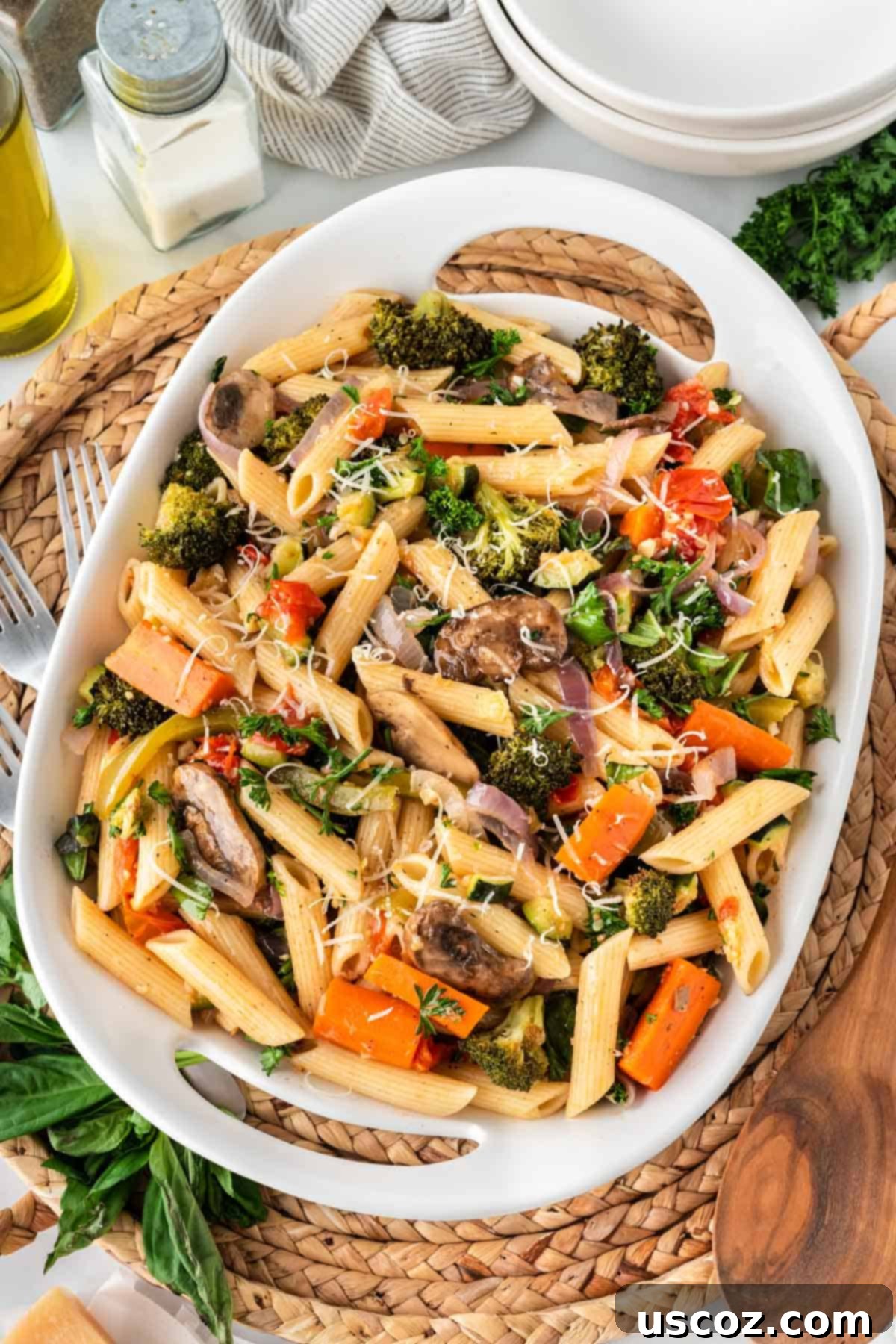 Hearty Roasted Veggie Pasta 2 roasted veggie pasta in a white serving dish