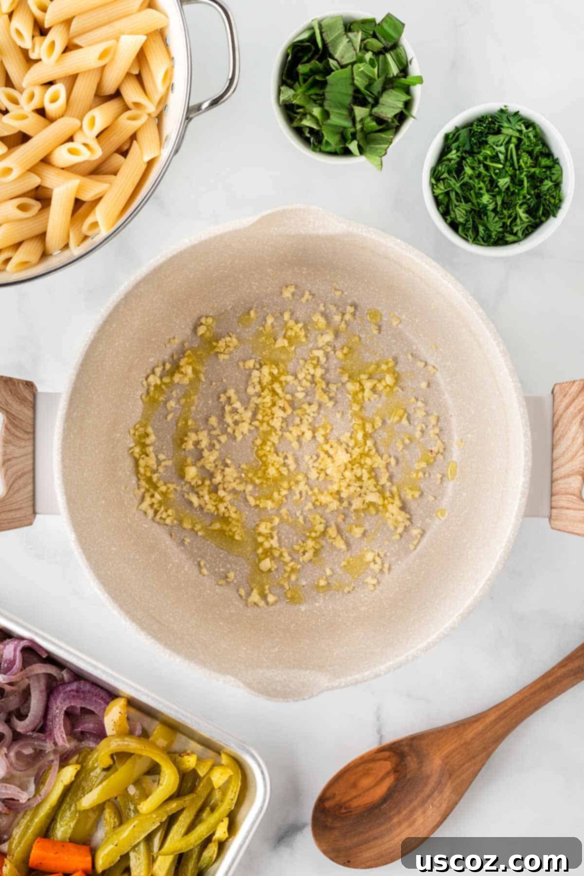 Hearty Roasted Veggie Pasta 9 minced garlic in a sauce pan