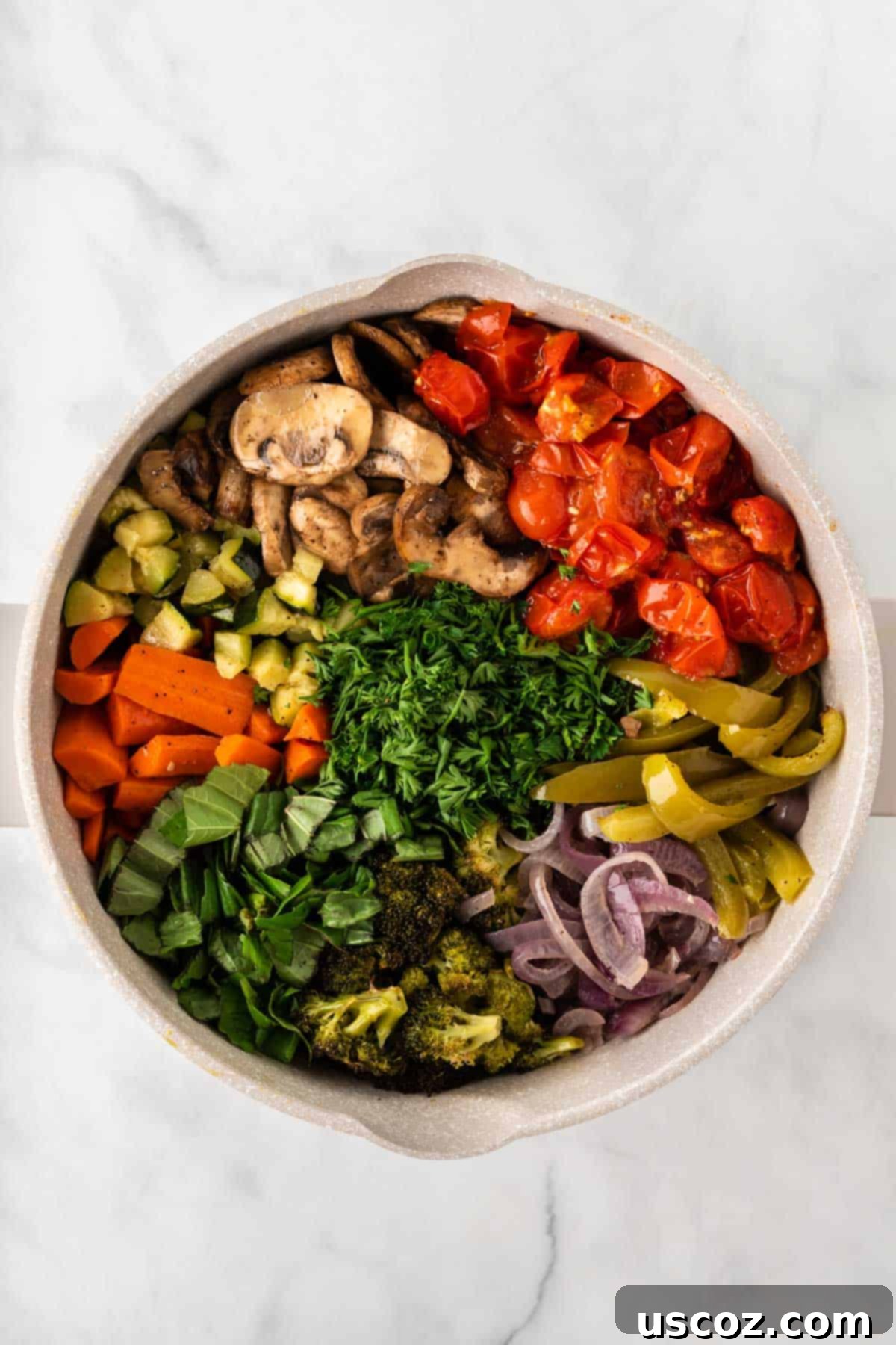 Hearty Roasted Veggie Pasta 10 adding the roasted vegetables and herbs to the pasta