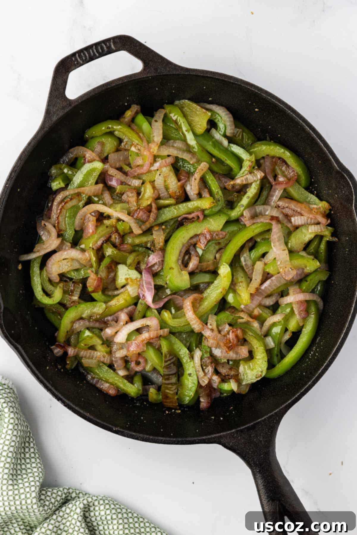 Sizzling Fajita Vegetables 8 Close-up of fully cooked chipotle fajita veggies in a skillet, showcasing their vibrant colors and perfectly tender-crisp texture.