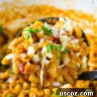 Hearty One-Pan Veggie Chili Mac 12 One Pot Vegetarian Chili Mac in a bowl, garnished with parsley