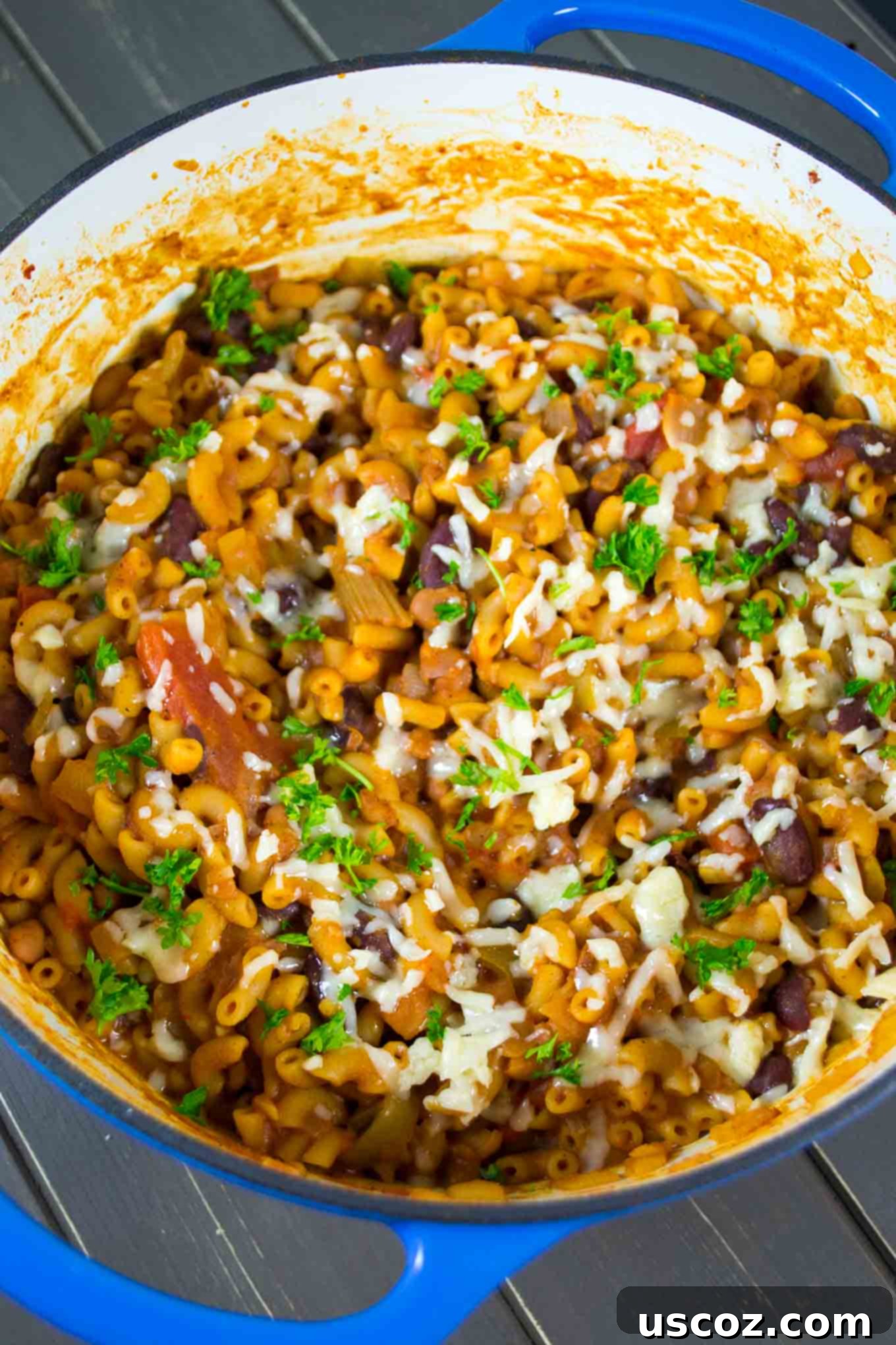 Hearty One-Pan Veggie Chili Mac 3 Close-up of hearty One Pot Vegetarian Chili Mac in a pot, showing beans and noodles