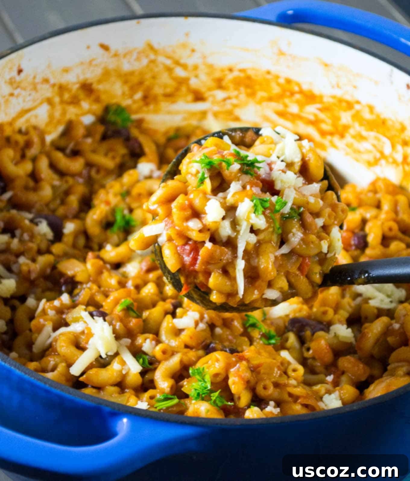 Hearty One-Pan Veggie Chili Mac 5 Cooking One Pot Vegetarian Chili Mac, noodles simmering in the sauce