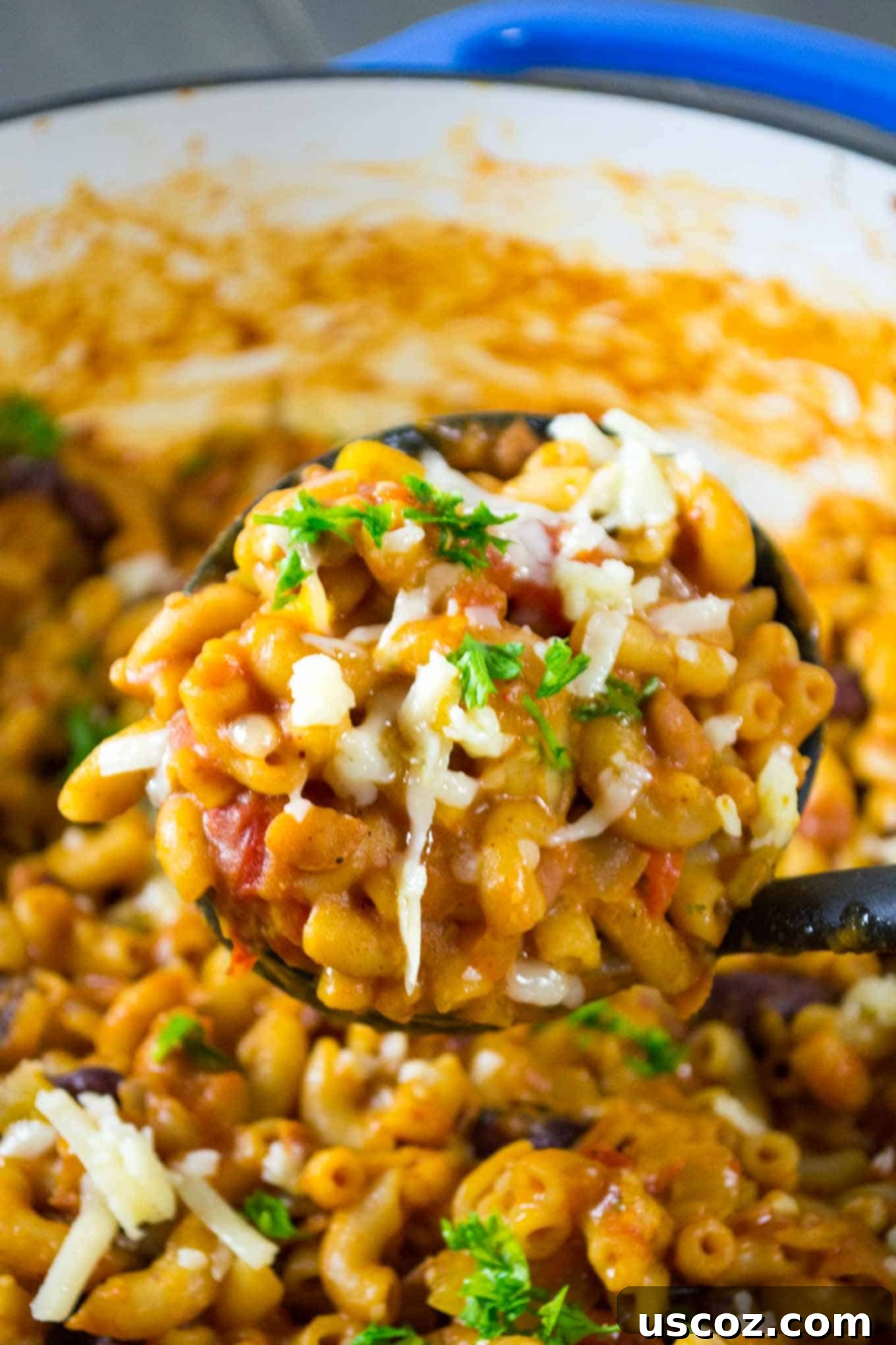 Hearty One-Pan Veggie Chili Mac 6 Adding sharp cheddar cheese to the cooked One Pot Vegetarian Chili Mac