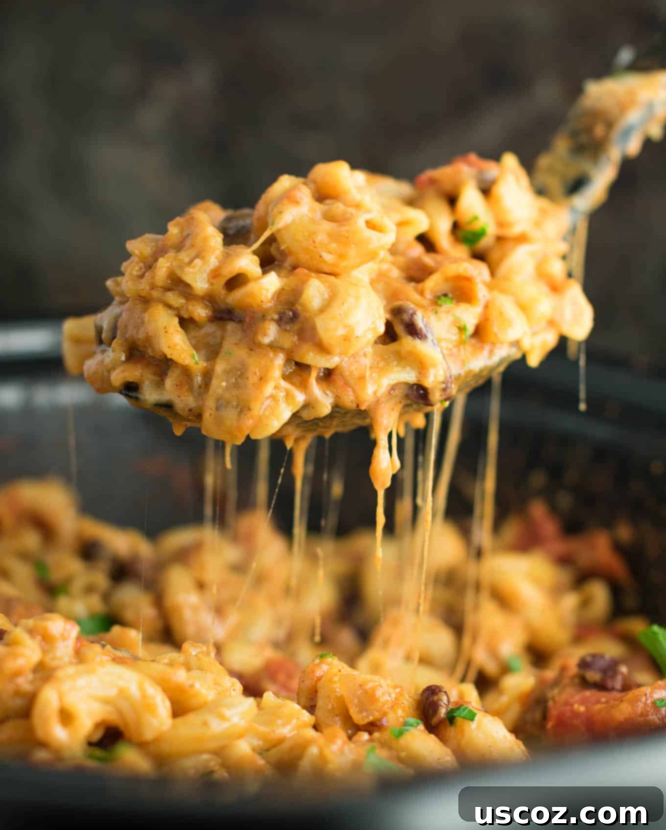 Hearty One-Pan Veggie Chili Mac 10 This Slow Cooker Vegetarian Chili Mac Recipe is made all in the crockpot (even the noodles!). A super easy vegetarian crockpot recipe to feed a crowd. #vegetarian #slowcooker #crockpot #chilimac