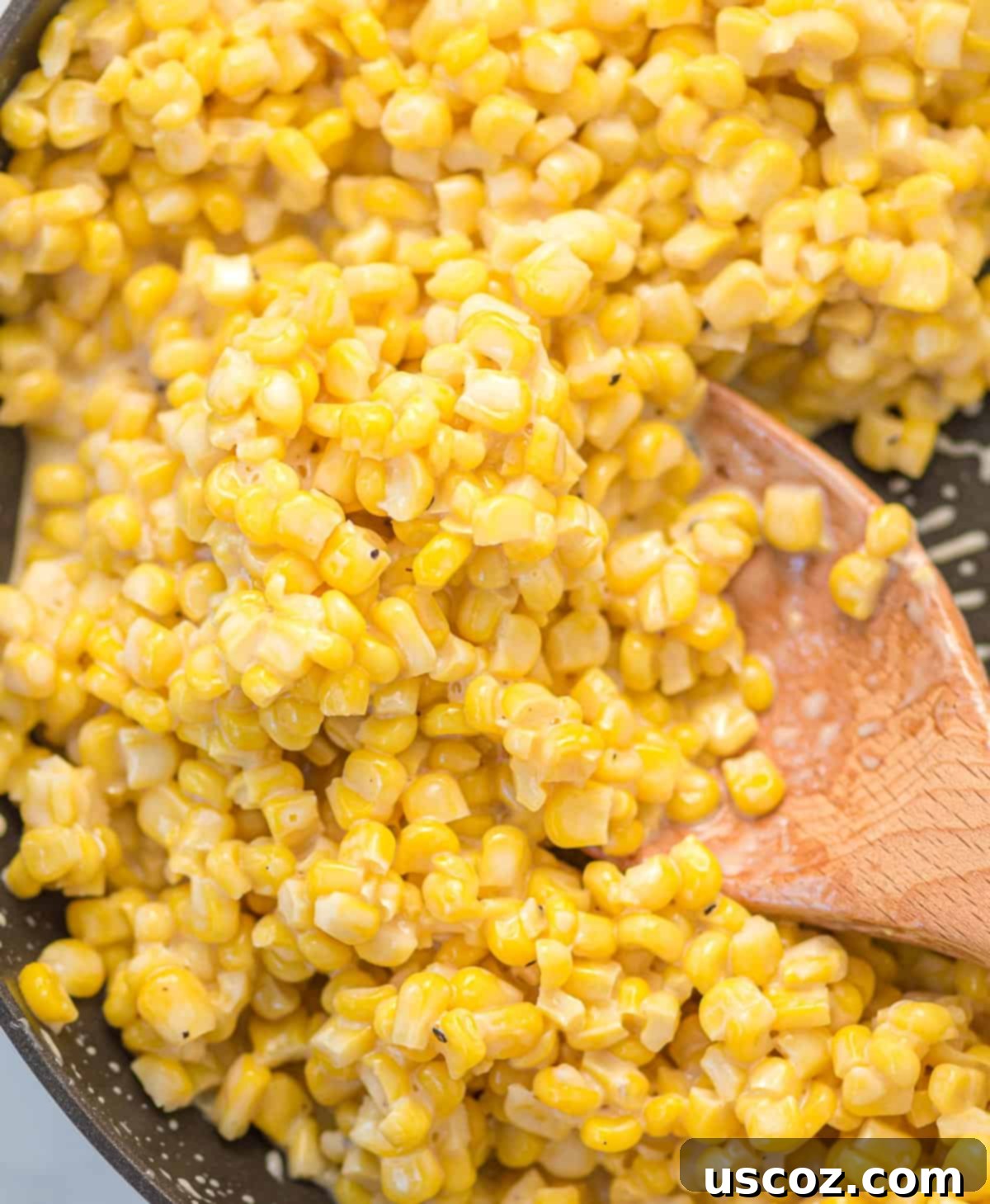 Sweet and Buttery Skillet Corn 5 honey butter corn in a skillet