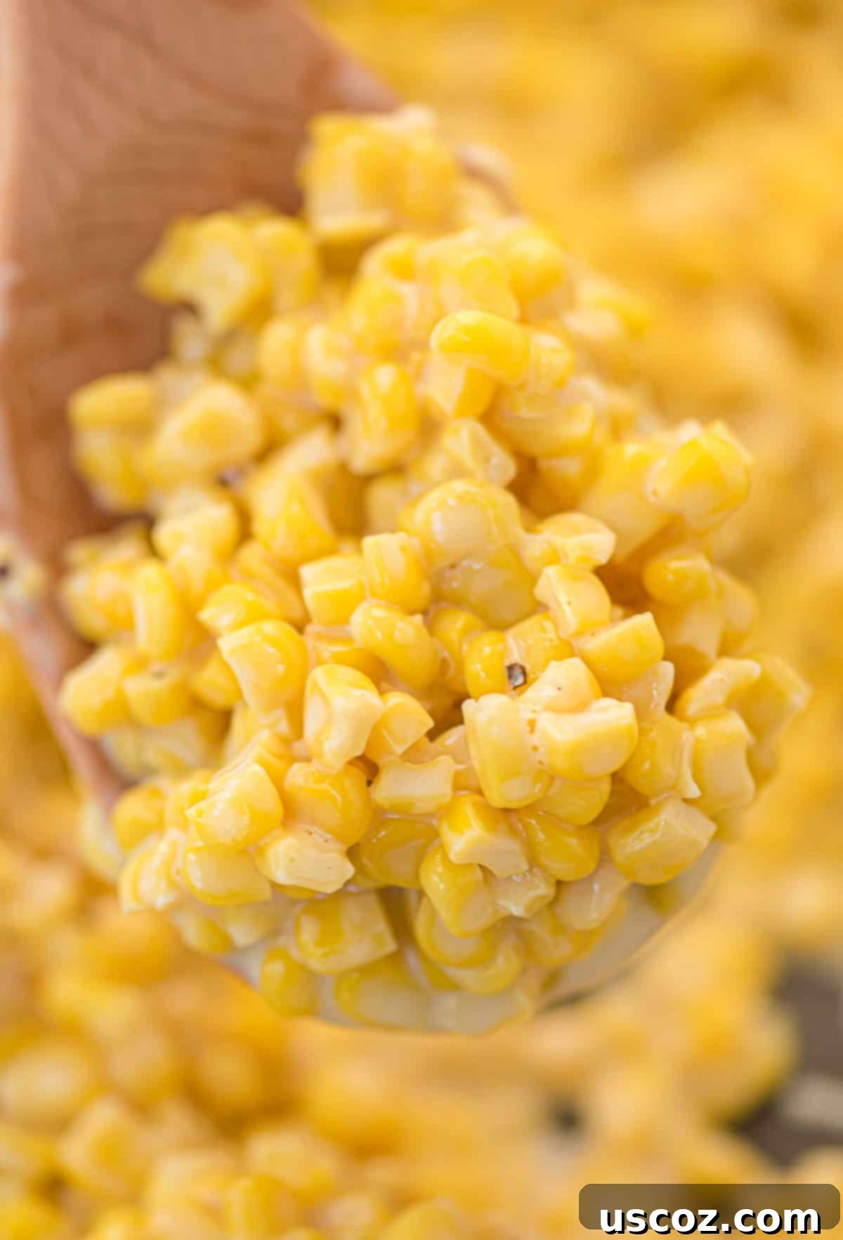 Sweet and Buttery Skillet Corn 8 honey butter corn on a spoon