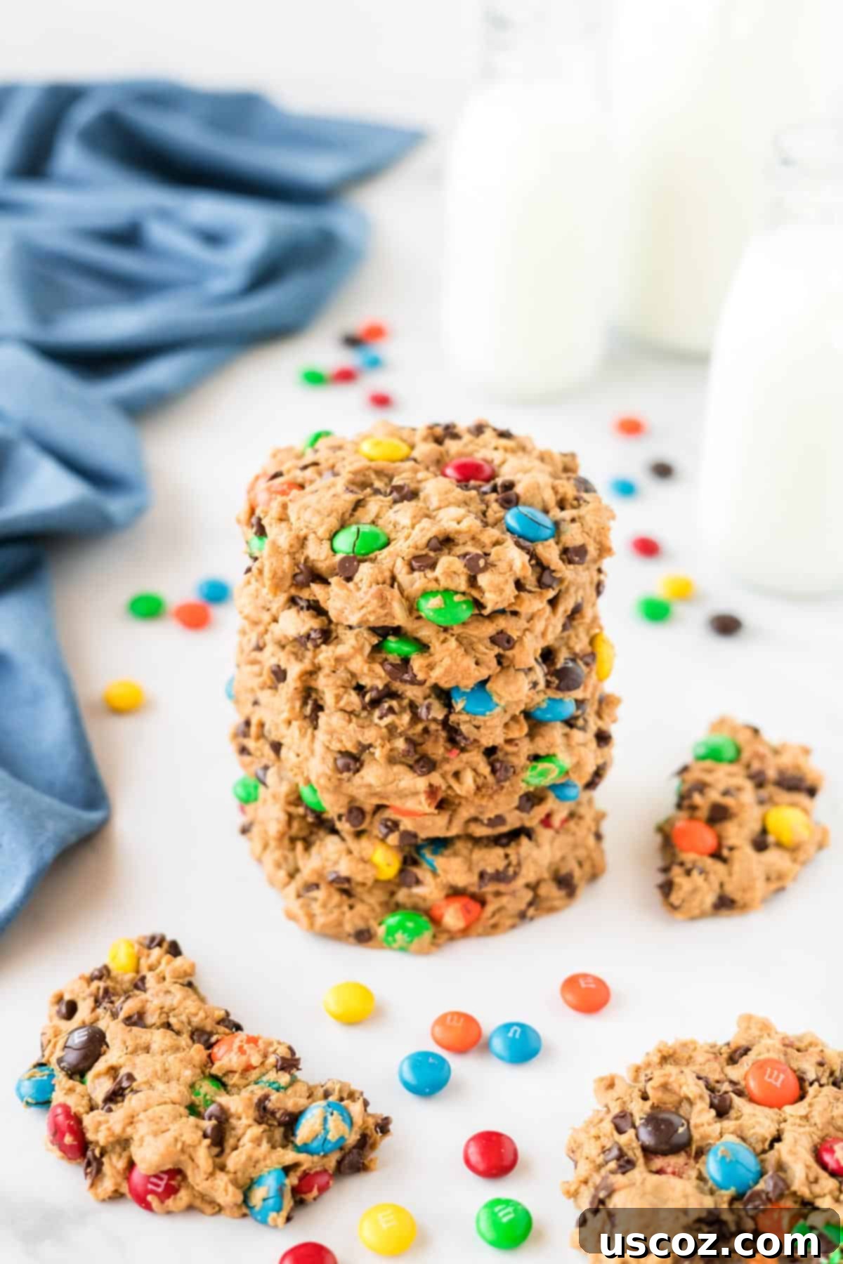 Irresistible Gluten-Free Monster Cookies 13 A stack of perfectly baked gluten-free monster cookies, showcasing their chewy texture and colorful M&M's.