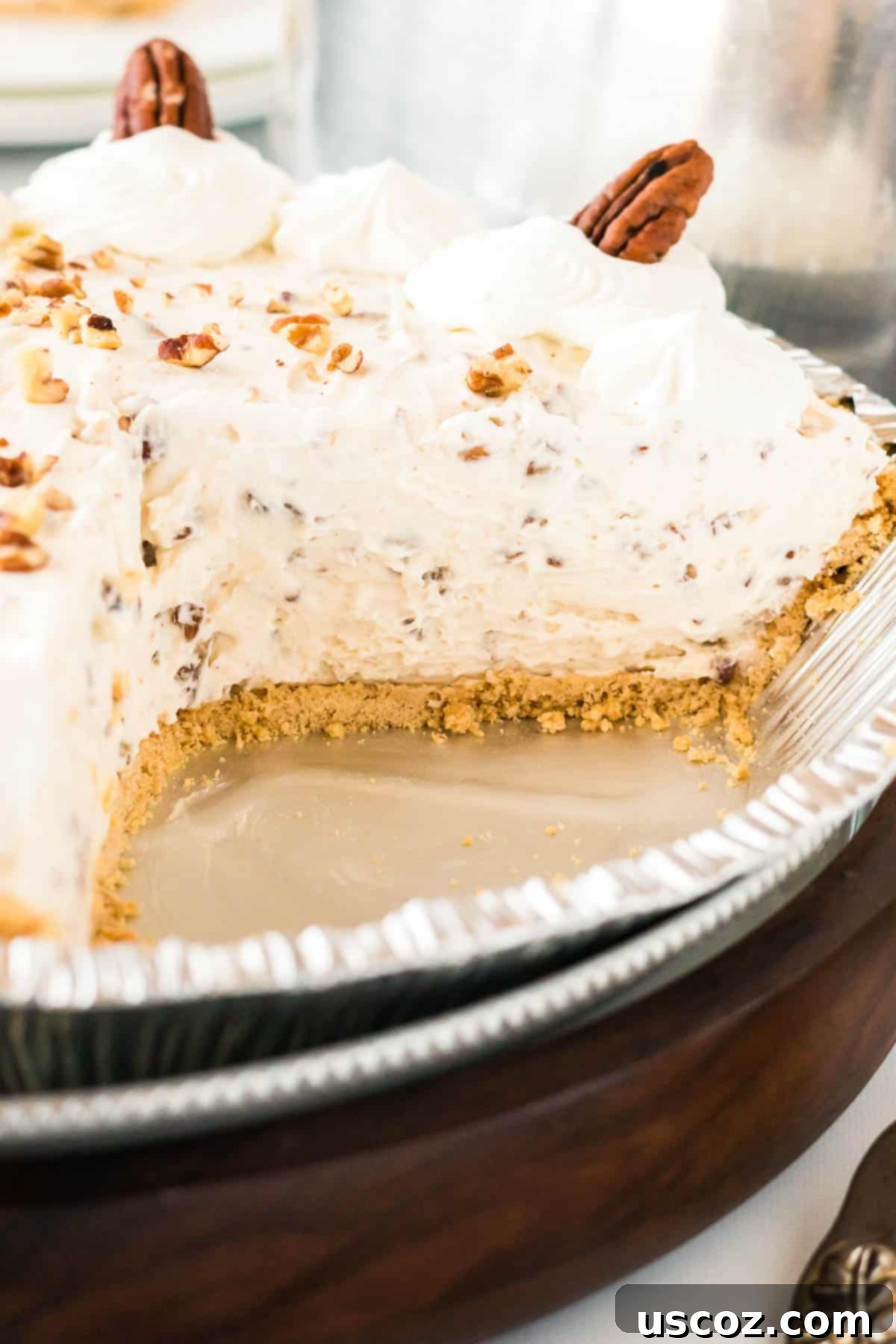 Velvet Pecan Delight 9 A full, beautifully garnished no-bake pecan pie, glistening and ready to be served.
