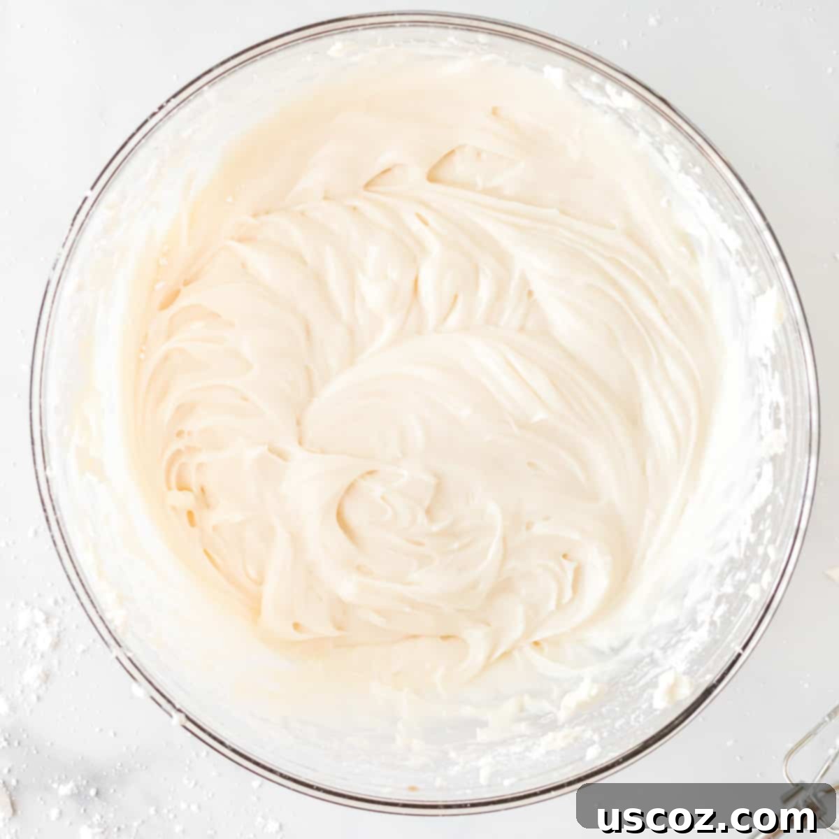 Effortless Cinnamon Swirls 13 freshly made homemade cream cheese icing, smooth and ready to spread