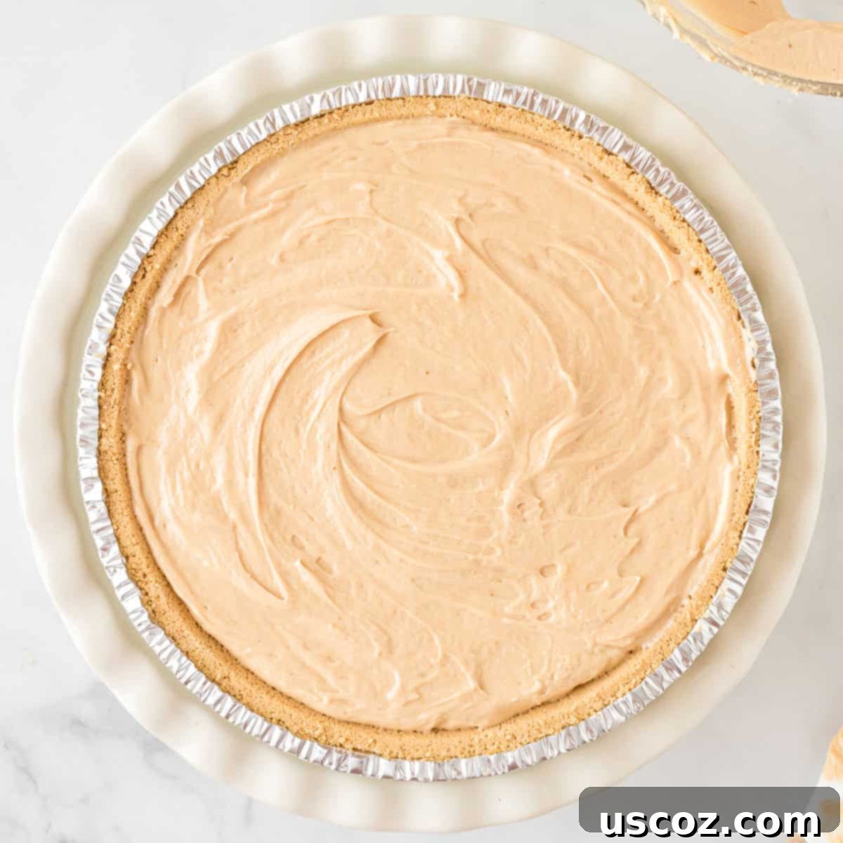 Simple No-Bake Peanut Butter Delight 11 The no-bake peanut butter pie filling smoothed out perfectly in the graham cracker crust.