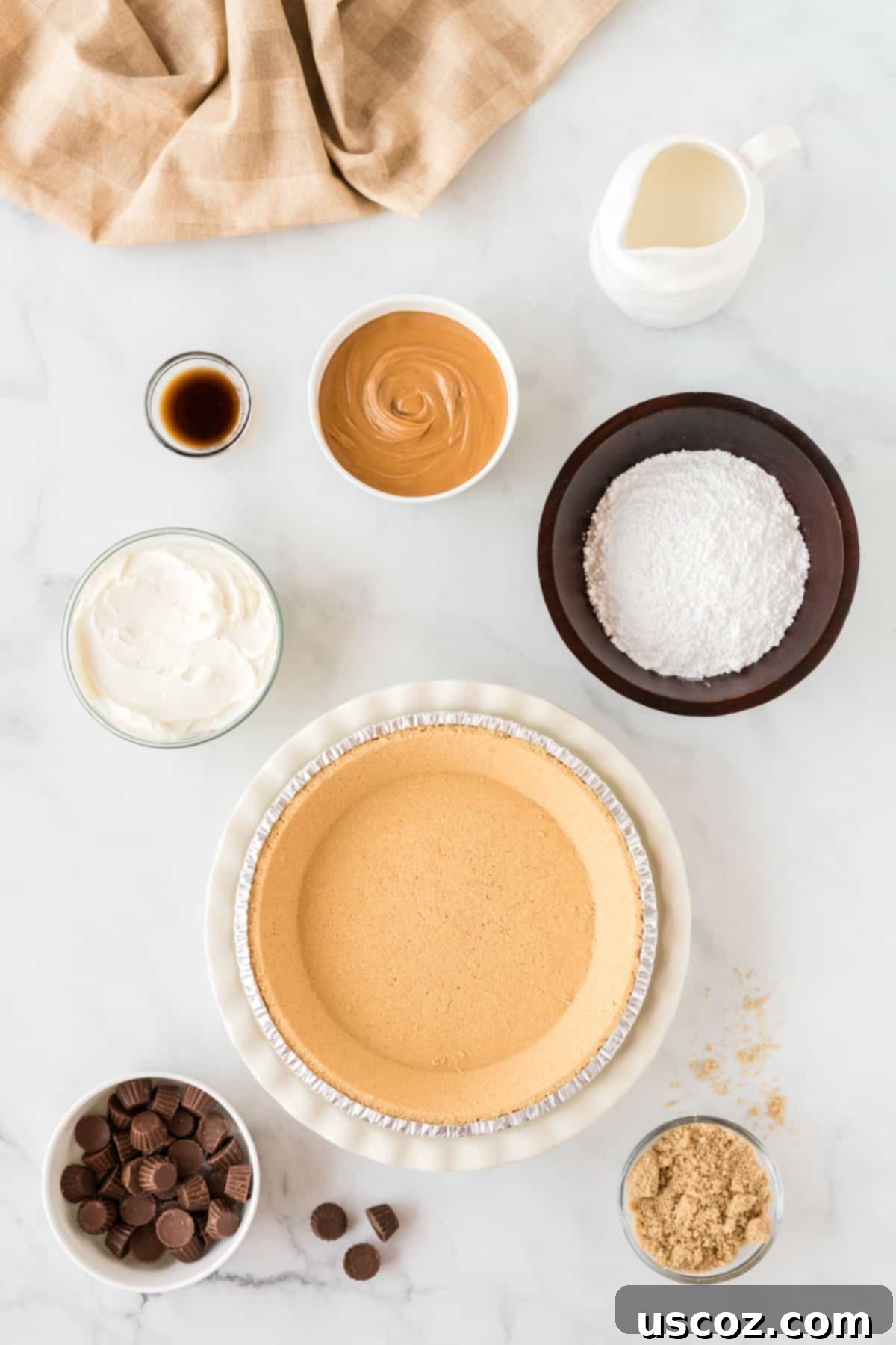 Simple No-Bake Peanut Butter Delight 4 Close-up of all the ingredients needed to make a delicious no-bake peanut butter pie, neatly arranged.