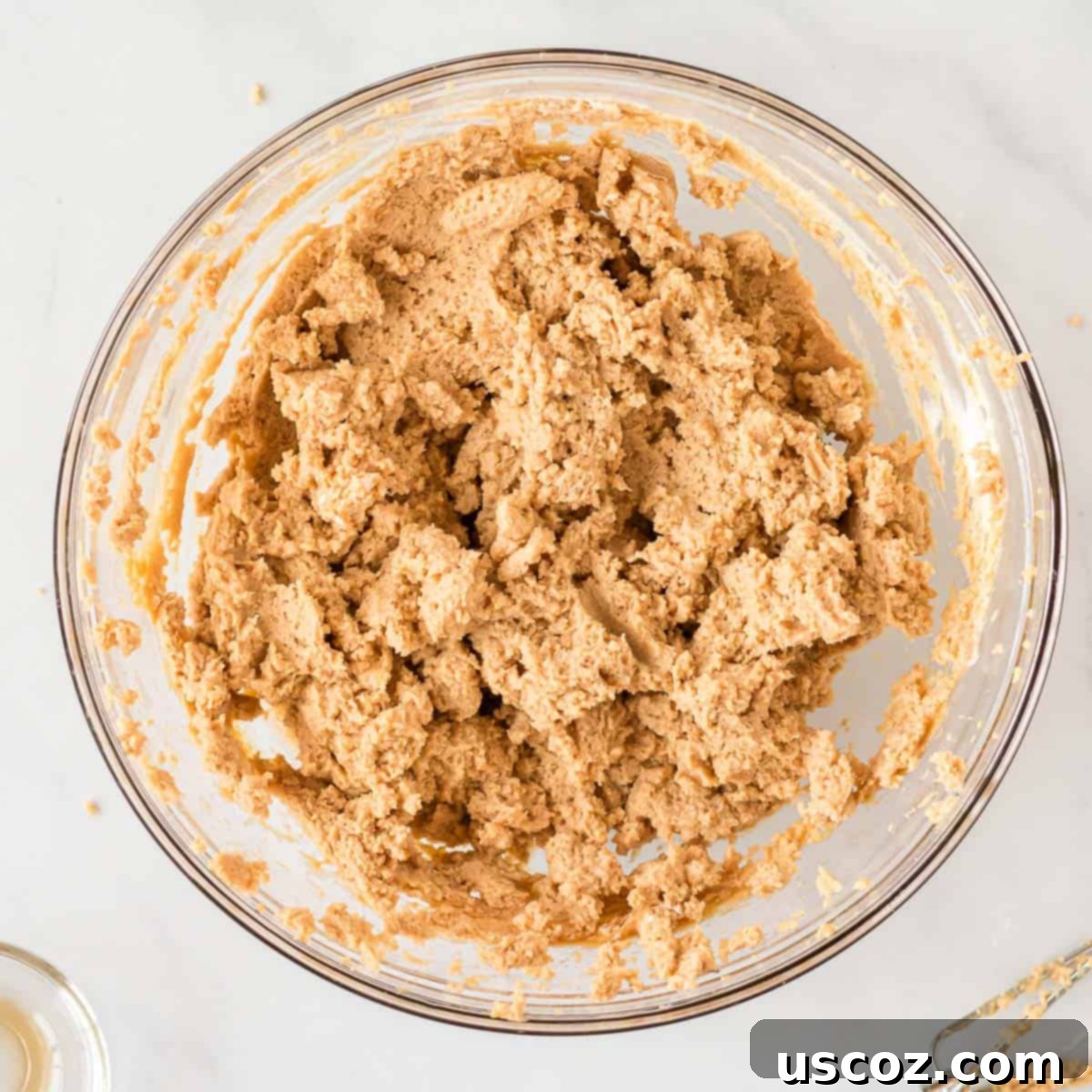Simple No-Bake Peanut Butter Delight 7 Cream cheese and creamy peanut butter perfectly blended together in a bowl.