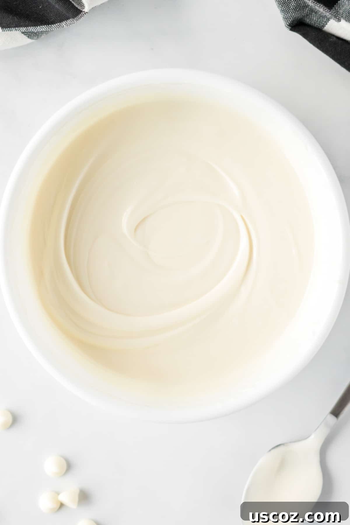 Strawberry Whispers 6 melted white chocolate in a bowl