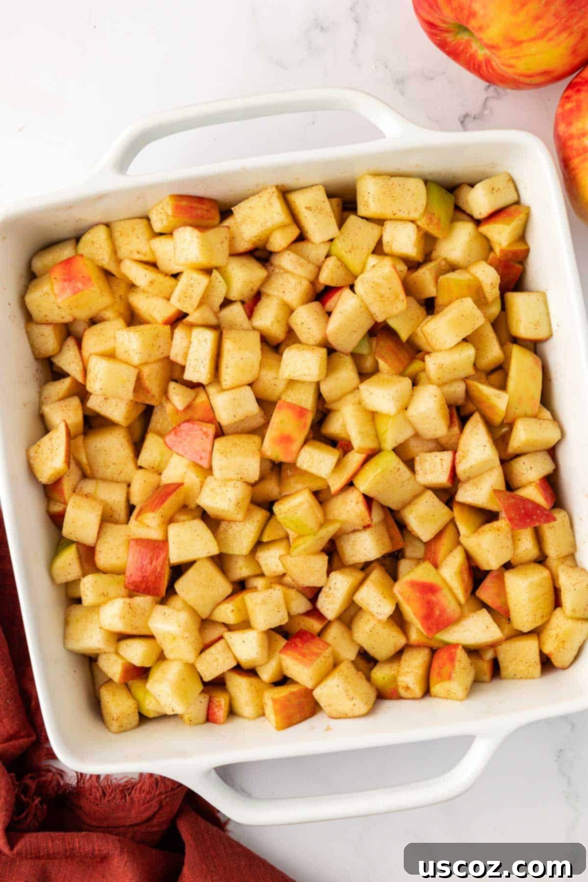 Comforting Vegan Apple Crisp 12 apple filling in a baking dish
