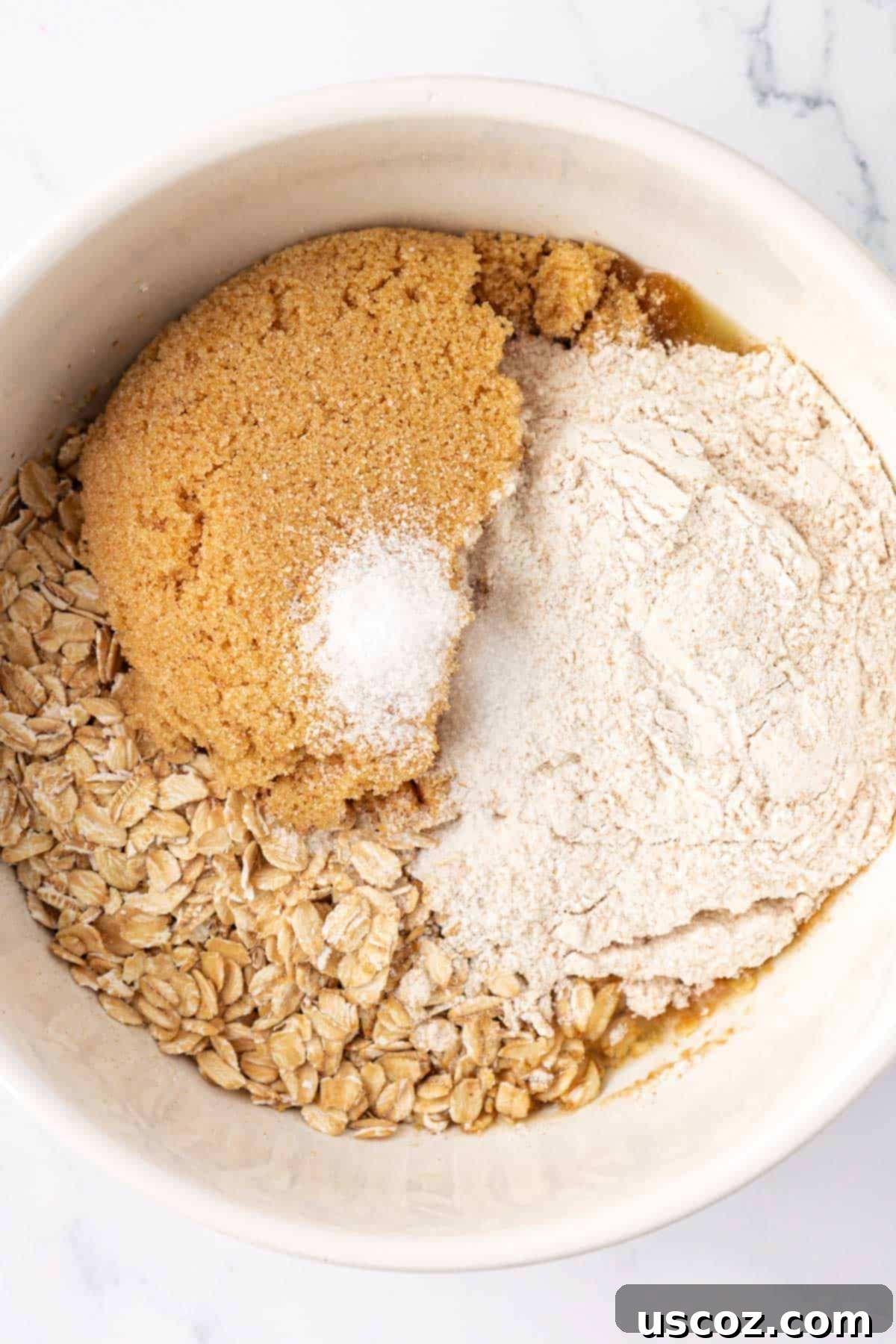 Comforting Vegan Apple Crisp 10 crisp topping ingredients in a bowl