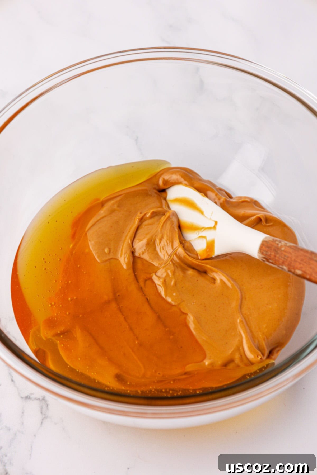 Effortless Protein Bars 5 peanut butter and honey in a mixing bowl