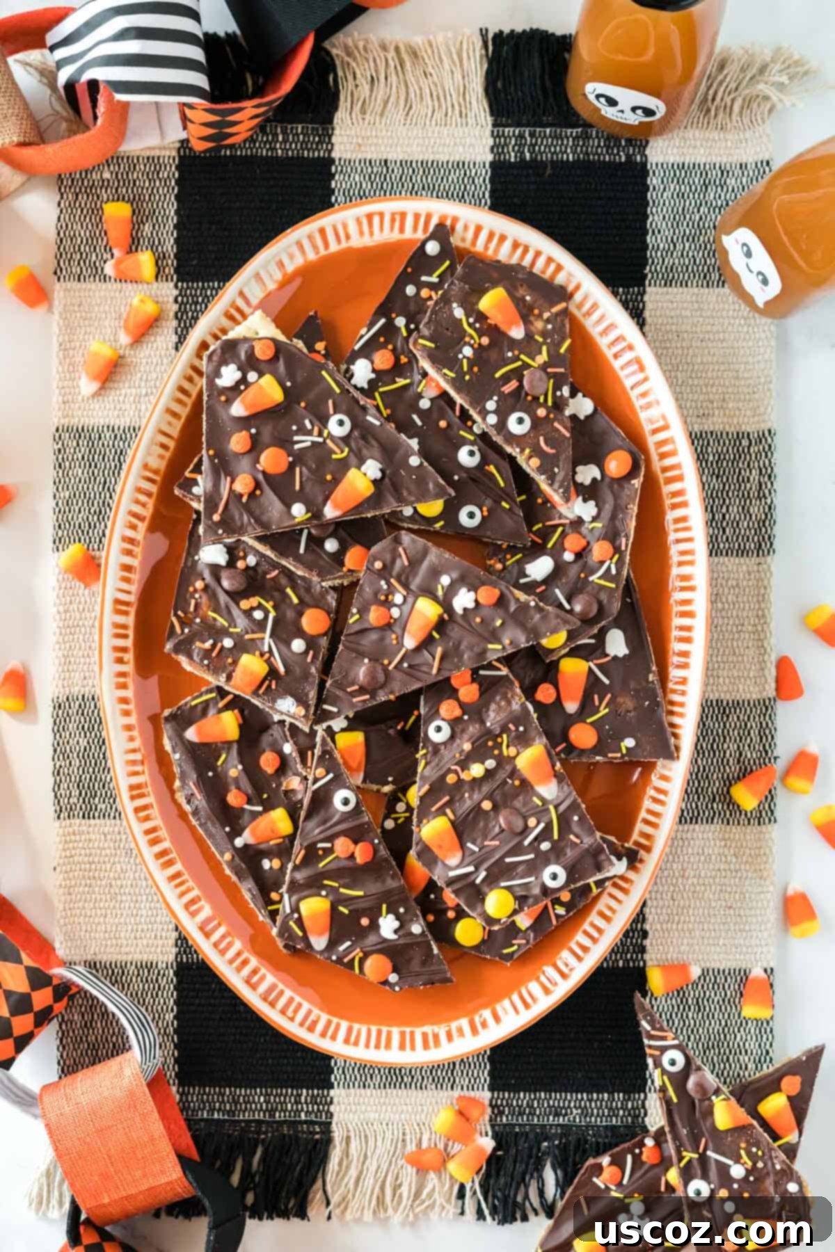 Spooky Halloween Crack 15 Halloween crack candy artfully arranged on an orange serving plate.