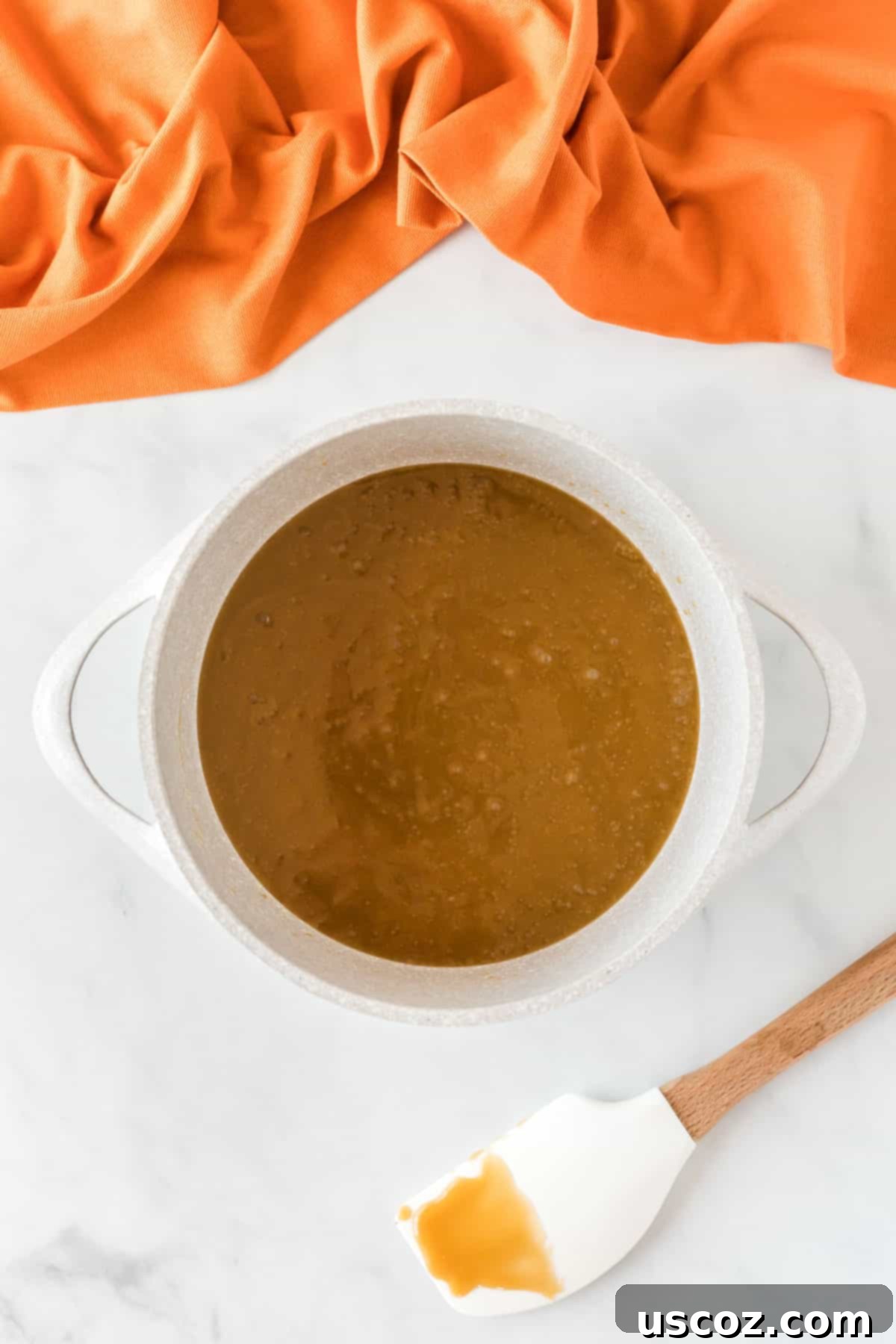 Spooky Halloween Crack 5 Thick, golden-brown toffee mixture of melted butter and brown sugar after boiling.