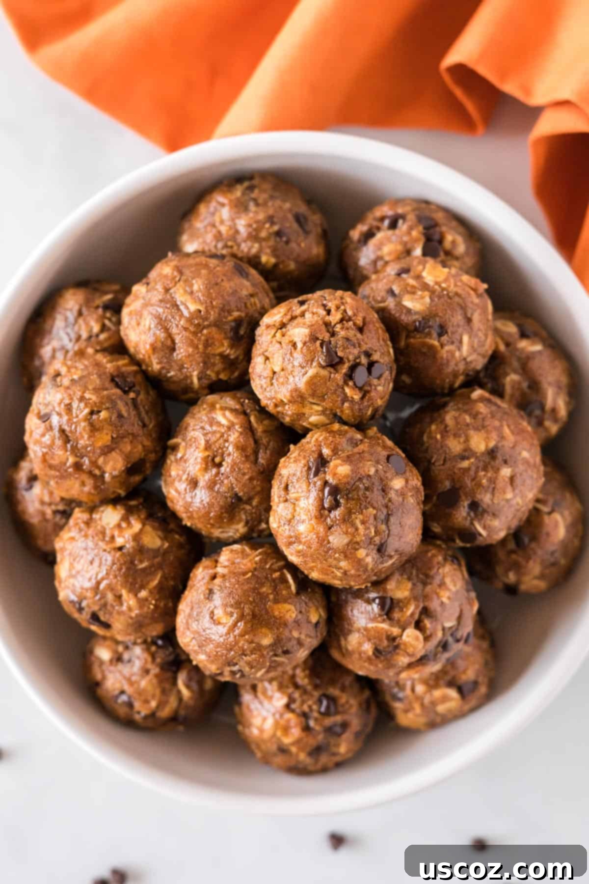 Pumpkin Protein Bites 11 A bowl of pumpkin energy balls, perfectly stacked and ready to eat
