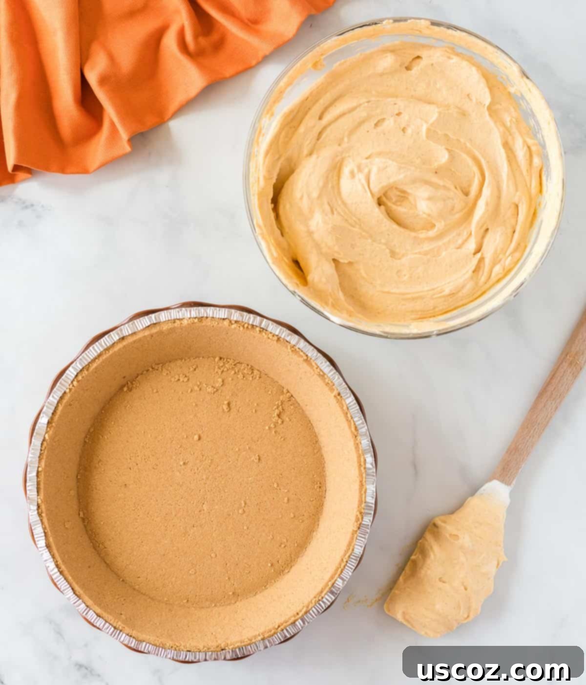Creamy Pumpkin Delight 11 pumpkin cream pie filling next to a graham cracker crust