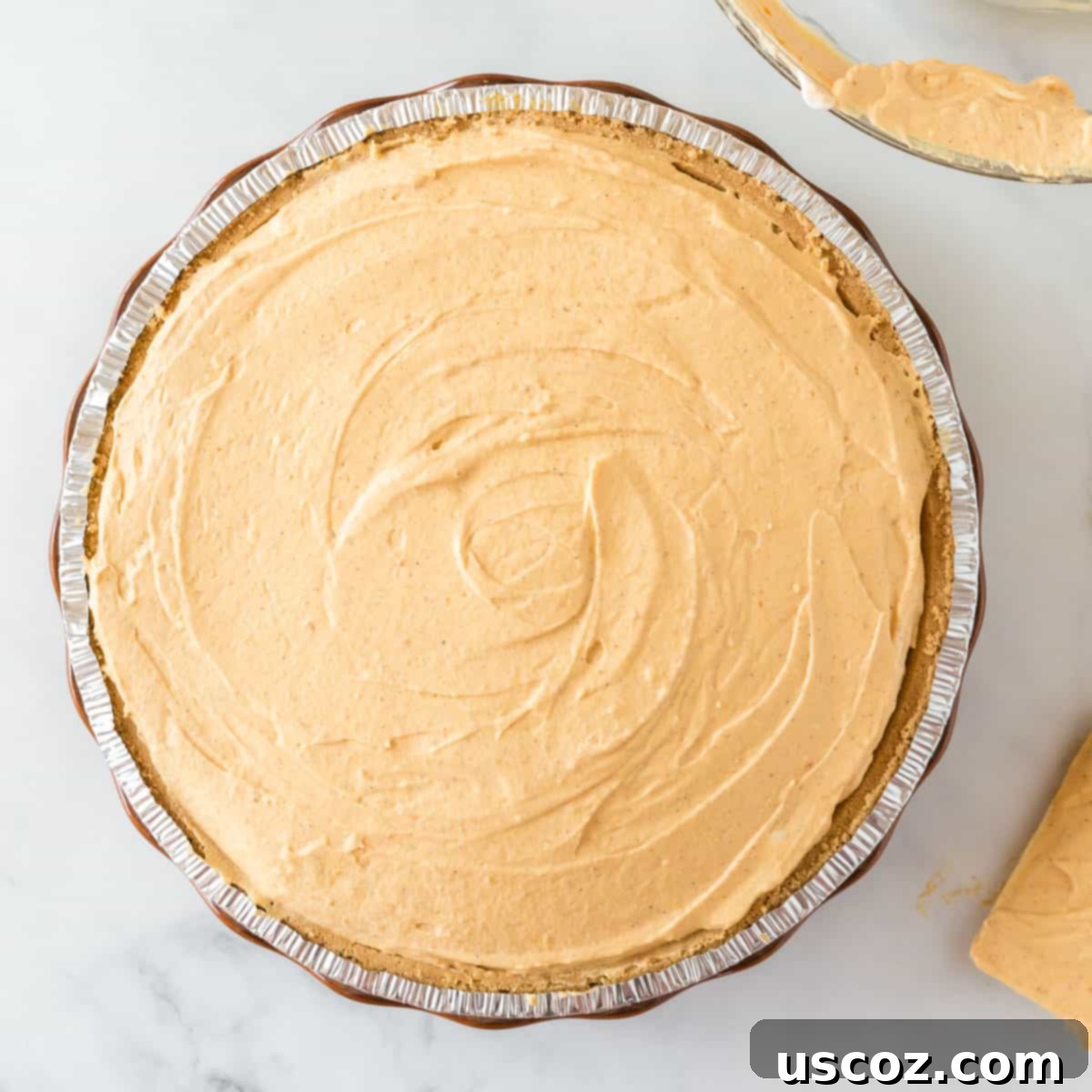 Creamy Pumpkin Delight 12 pumpkin pie filling smoothed out in the graham crust