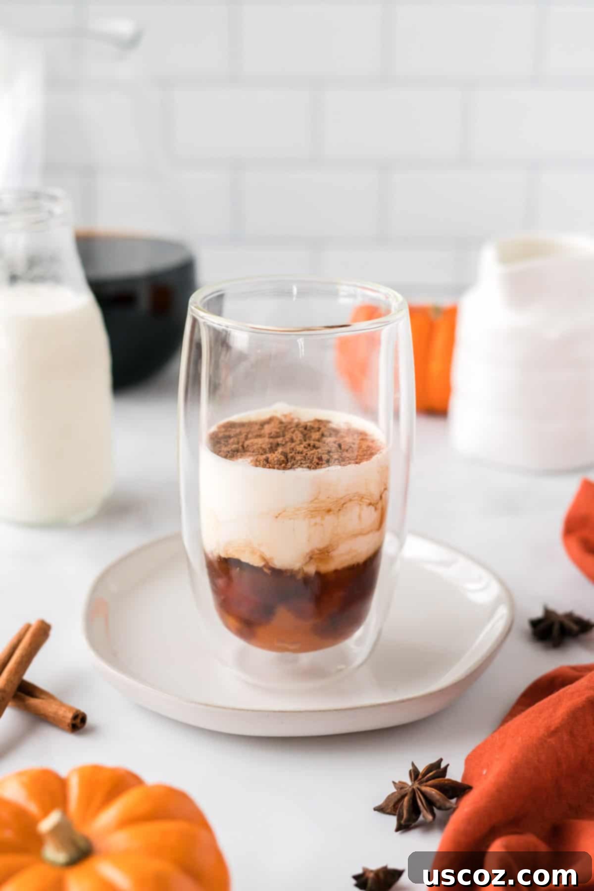 Spiced Pumpkin Cold Brew 4 Ingredients for pumpkin cream cold foam in a glass, ready for mixing