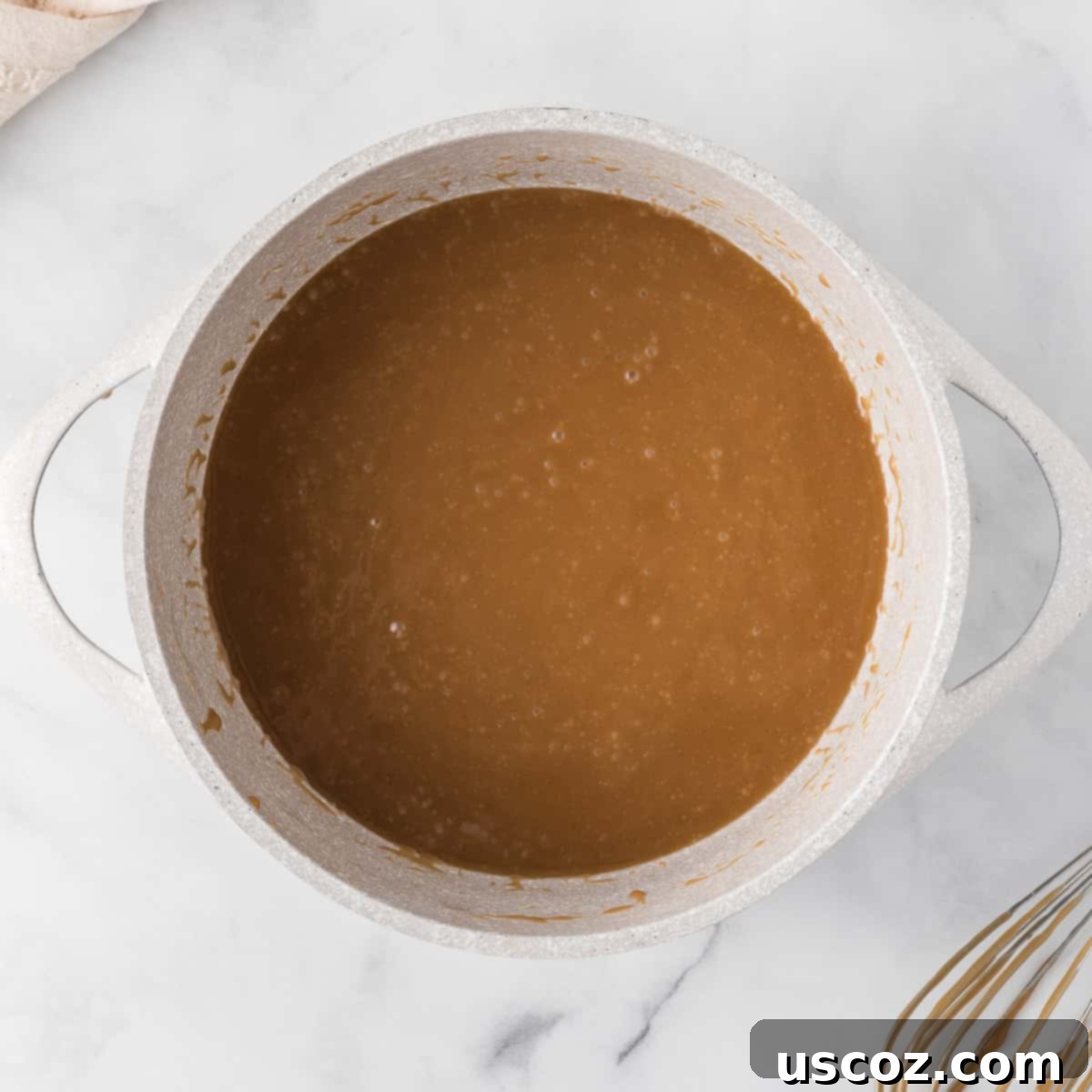 Golden Graham Toffee 7 toffee mixture simmering in a saucepan