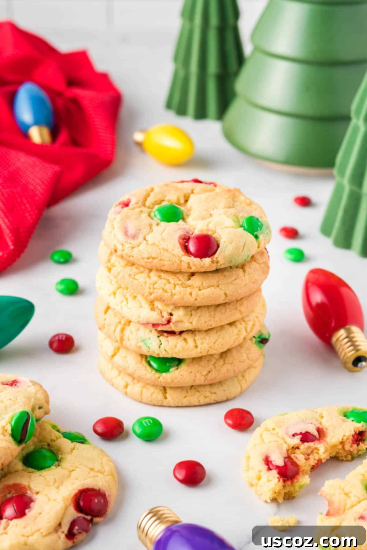 Effortless Holiday Cake Mix Cookies 11 Beautifully stacked Christmas cookies surrounded by festive holiday decorations