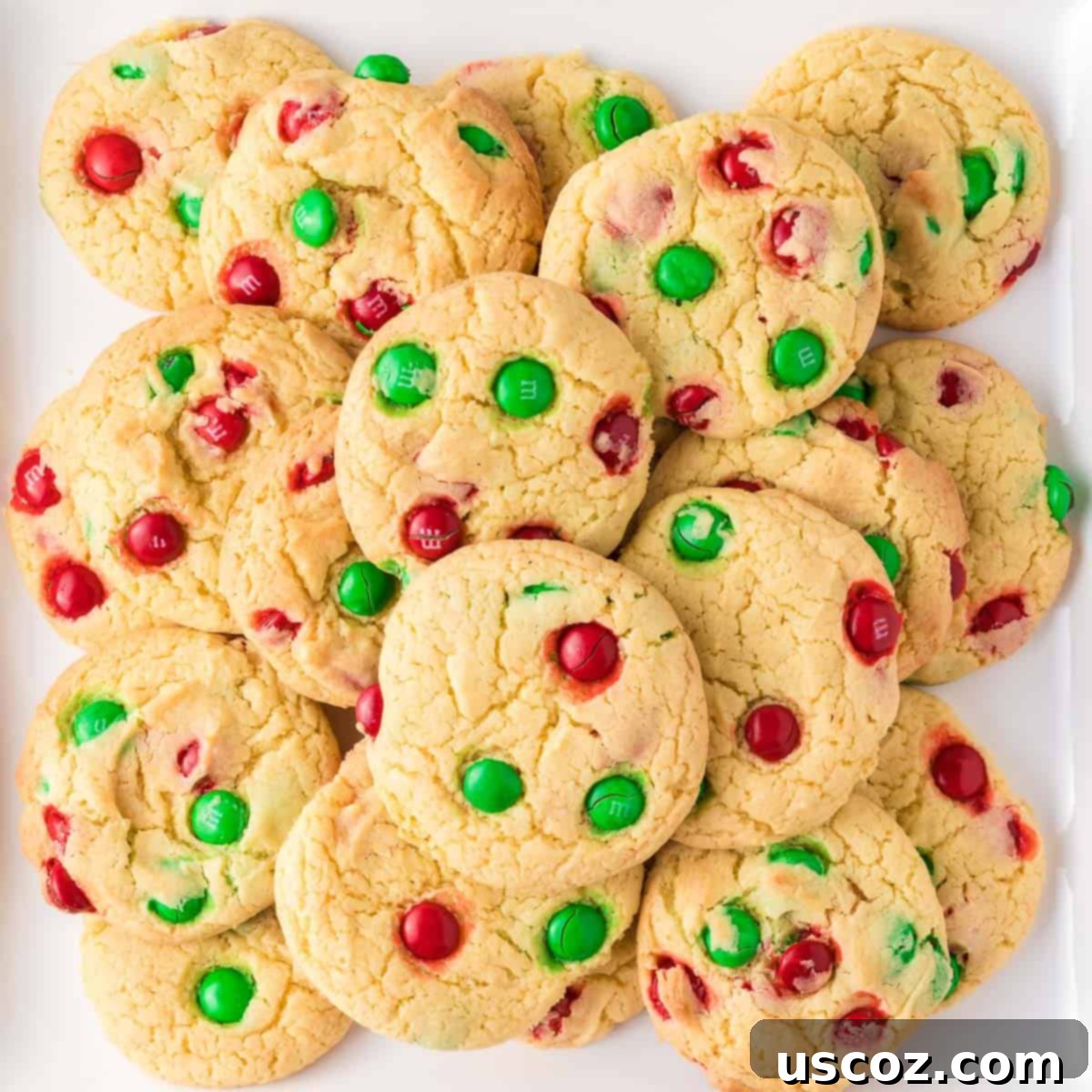 Effortless Holiday Cake Mix Cookies 12 Beautifully arranged Christmas cookies on a white serving platter, ready to be enjoyed
