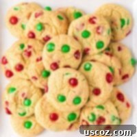 Effortless Holiday Cake Mix Cookies 13 Christmas cookies on a white serving platter