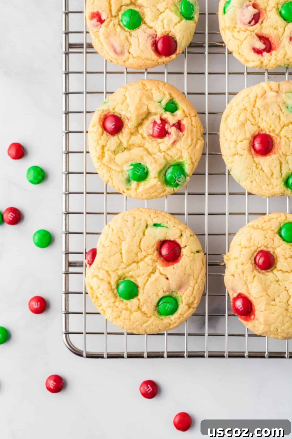 Effortless Holiday Cake Mix Cookies 3 Freshly baked cake mix Christmas cookies cooling on a wire rack, still warm and inviting
