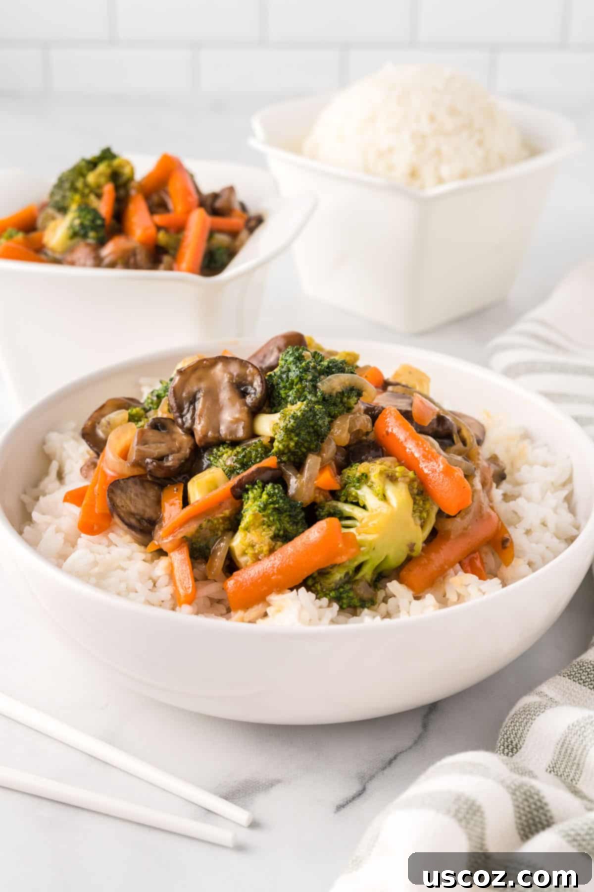 Sizzling Teriyaki Harvest 2 teriyaki vegetables over white rice in a bowl