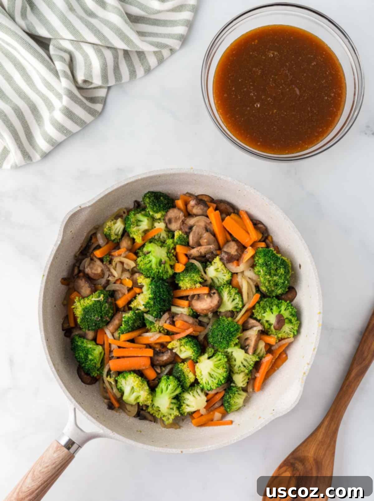 Sizzling Teriyaki Harvest 6 cooked vegetables next to teriyaki sauce