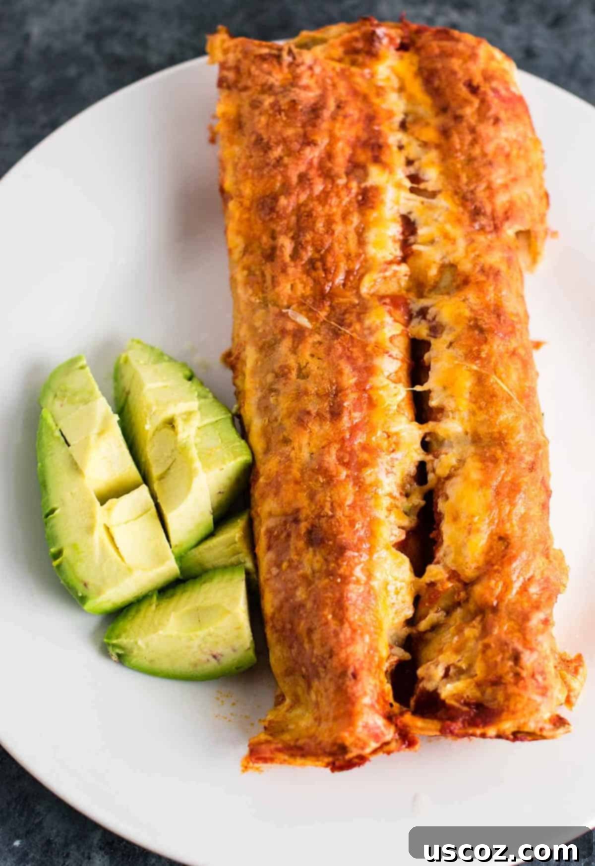Cheesy Refried Bean Enchiladas 2 refried bean enchiladas - easy meatless mexican recipe. Made with homemade refried beans and mushrooms.