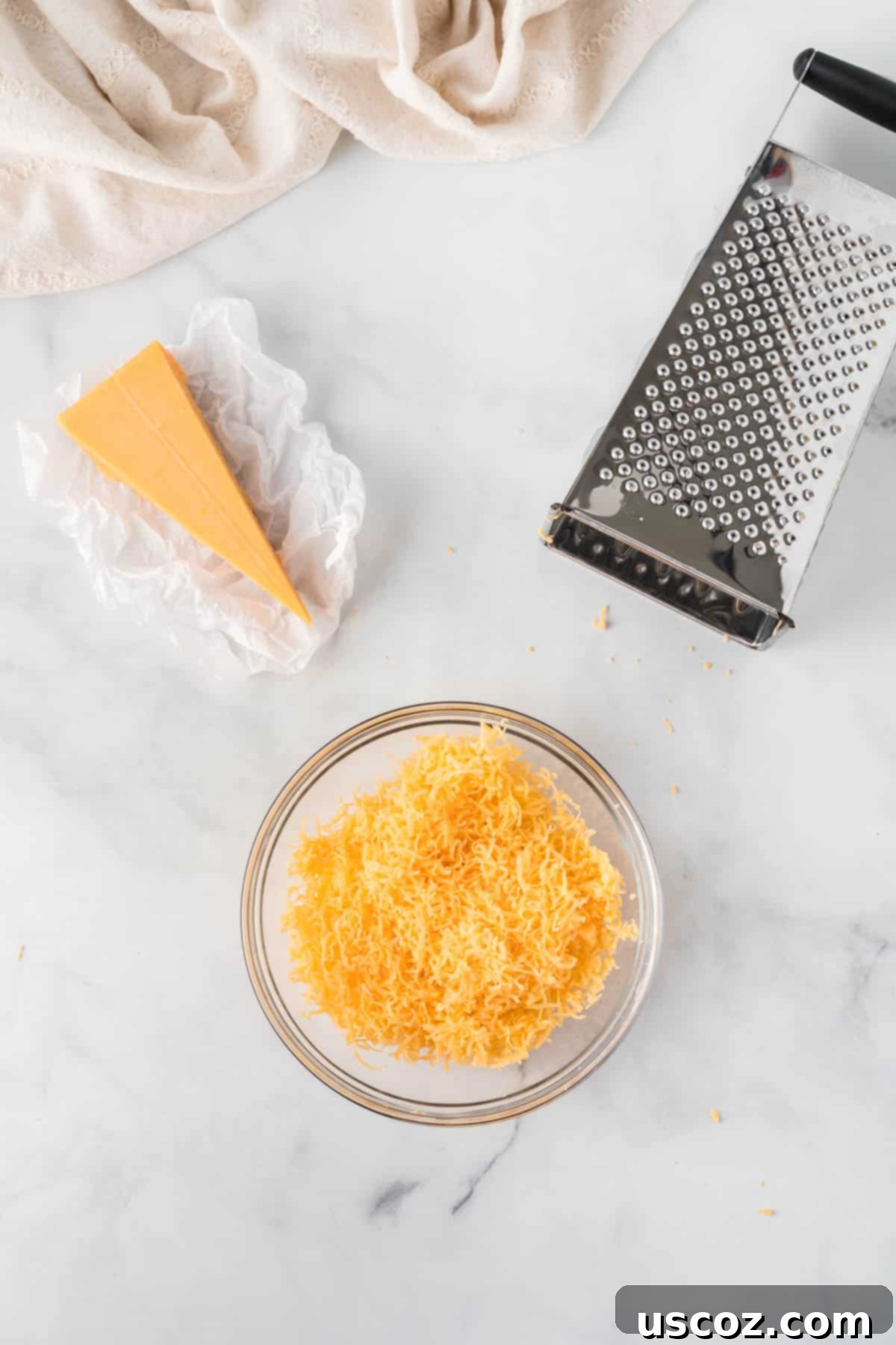 Classic Pimento Cheese Ball 5 fresh grated cheese in a bowl